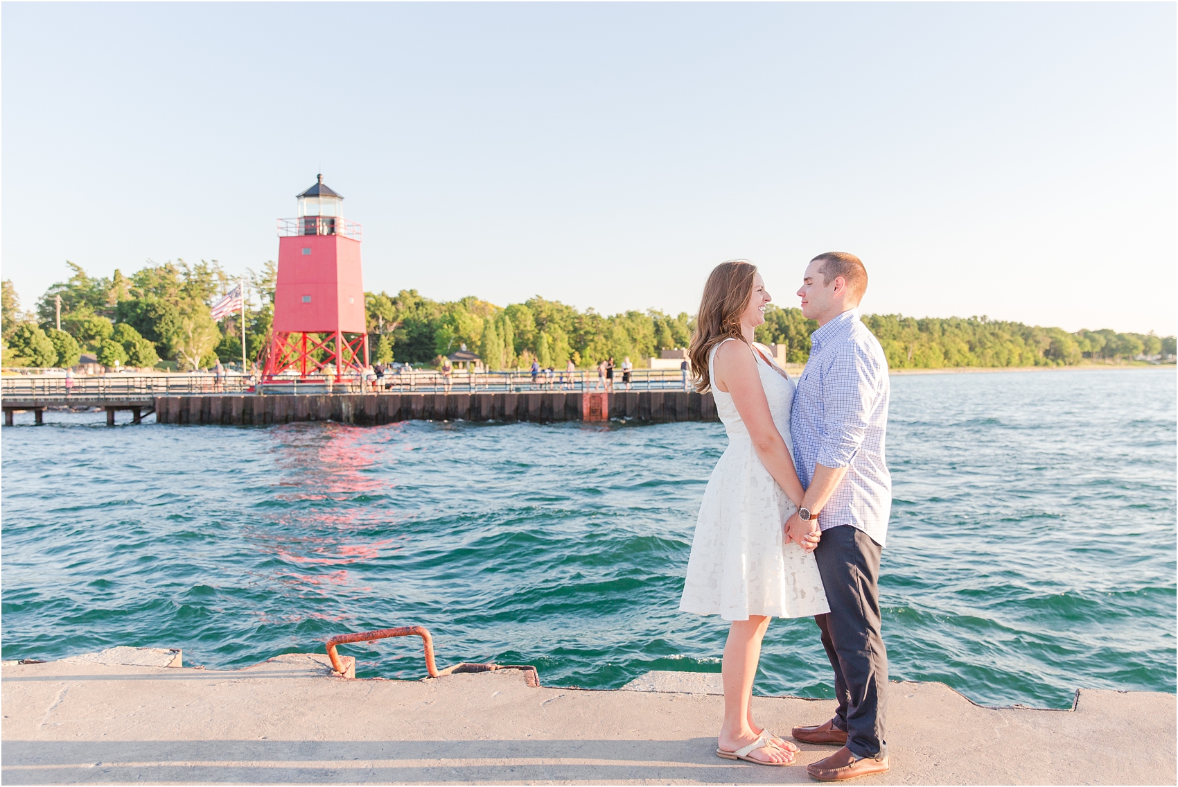 romantic-sunset-engagement-photos-in-downtown-charlevoix-mi-by-courtney-carolyn-photography_0001.jpg