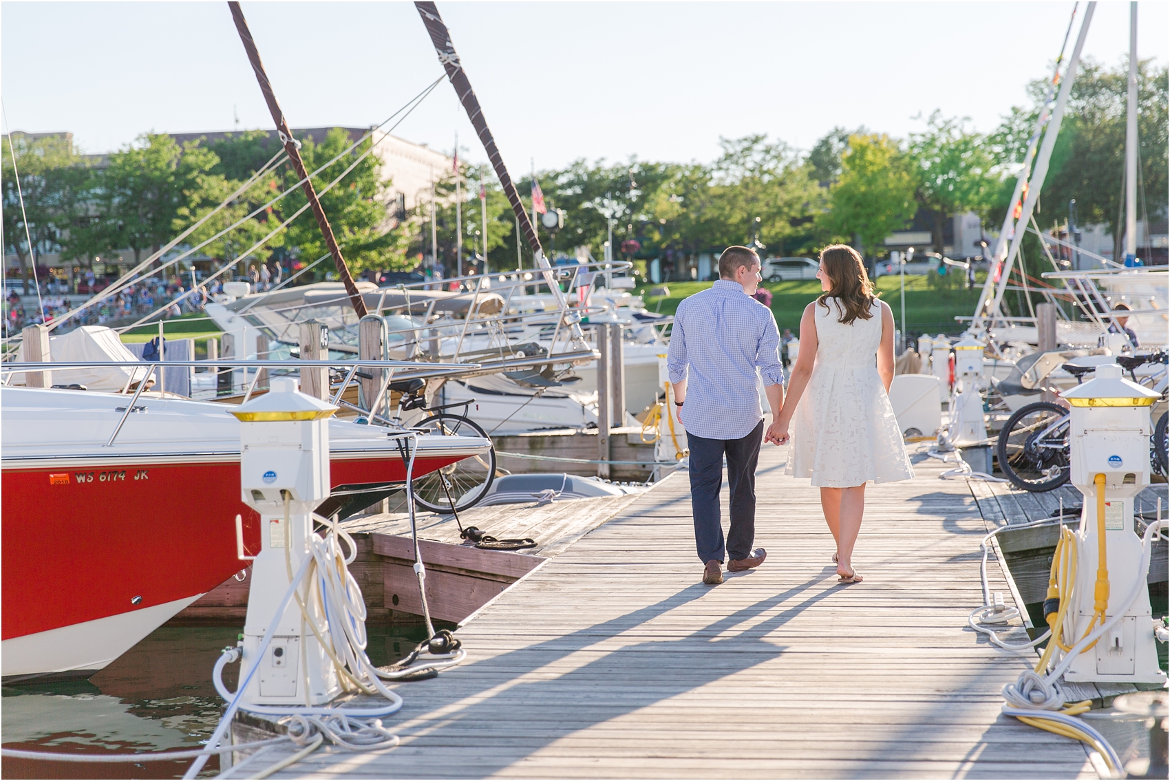 romantic-sunset-engagement-photos-in-downtown-charlevoix-mi-by-courtney-carolyn-photography_0003.jpg