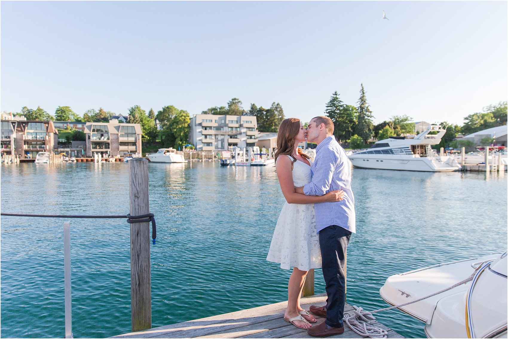 romantic-sunset-engagement-photos-in-downtown-charlevoix-mi-by-courtney-carolyn-photography_0005.jpg