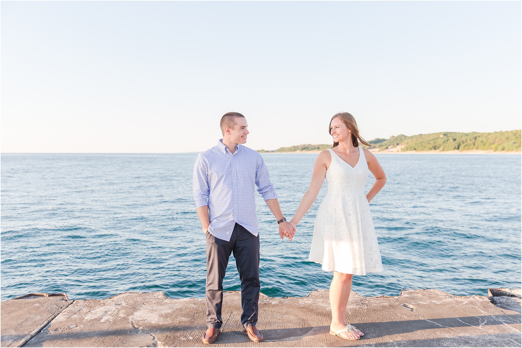 romantic-sunset-engagement-photos-at-the-lighthouse-in-charlevoix-mi-by-courtney-carolyn-photography_0001.jpg