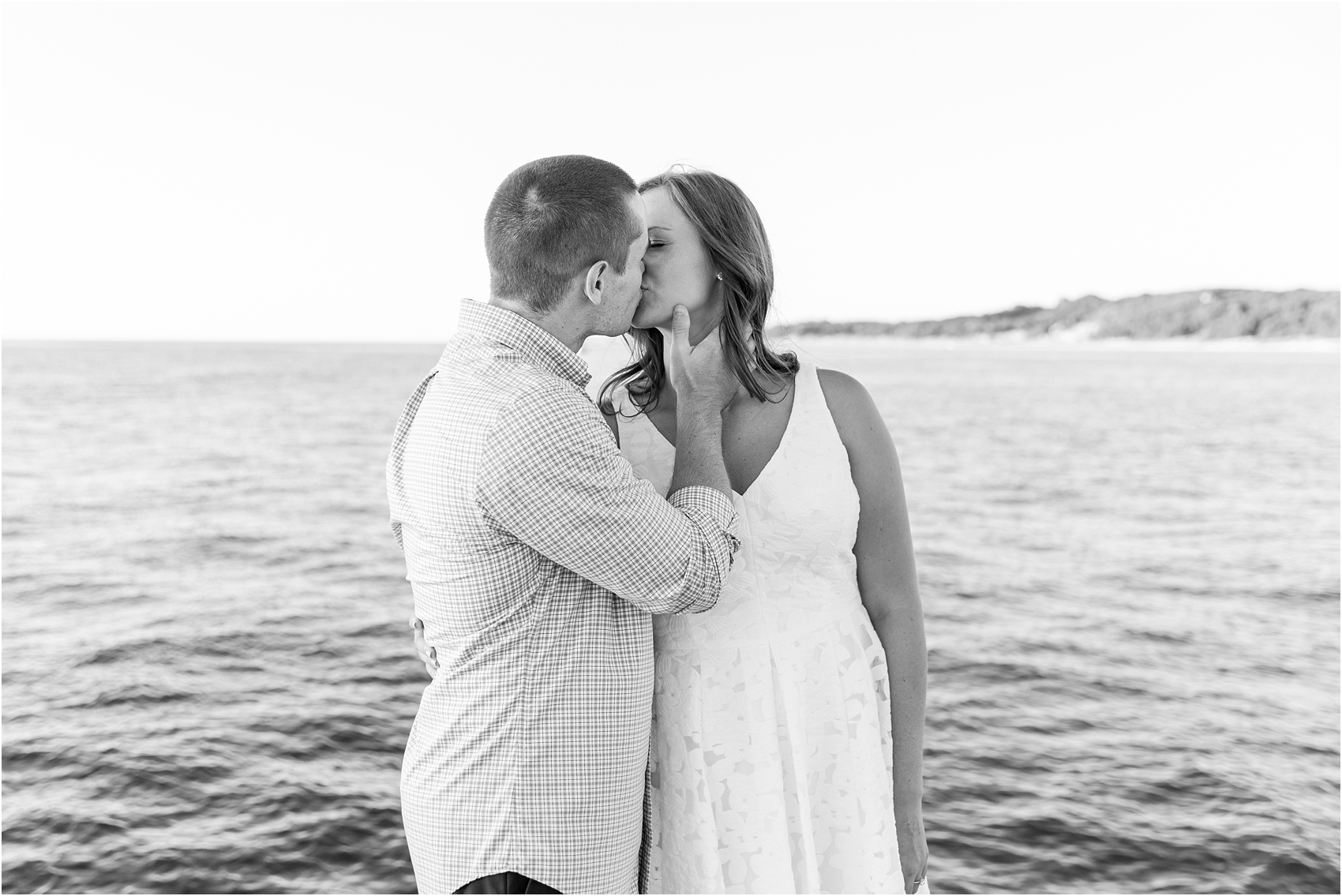 romantic-sunset-engagement-photos-at-the-lighthouse-in-charlevoix-mi-by-courtney-carolyn-photography_0012.jpg