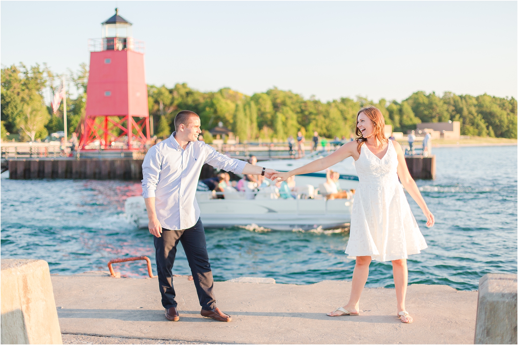 romantic-sunset-engagement-photos-at-the-lighthouse-in-charlevoix-mi-by-courtney-carolyn-photography_0013.jpg