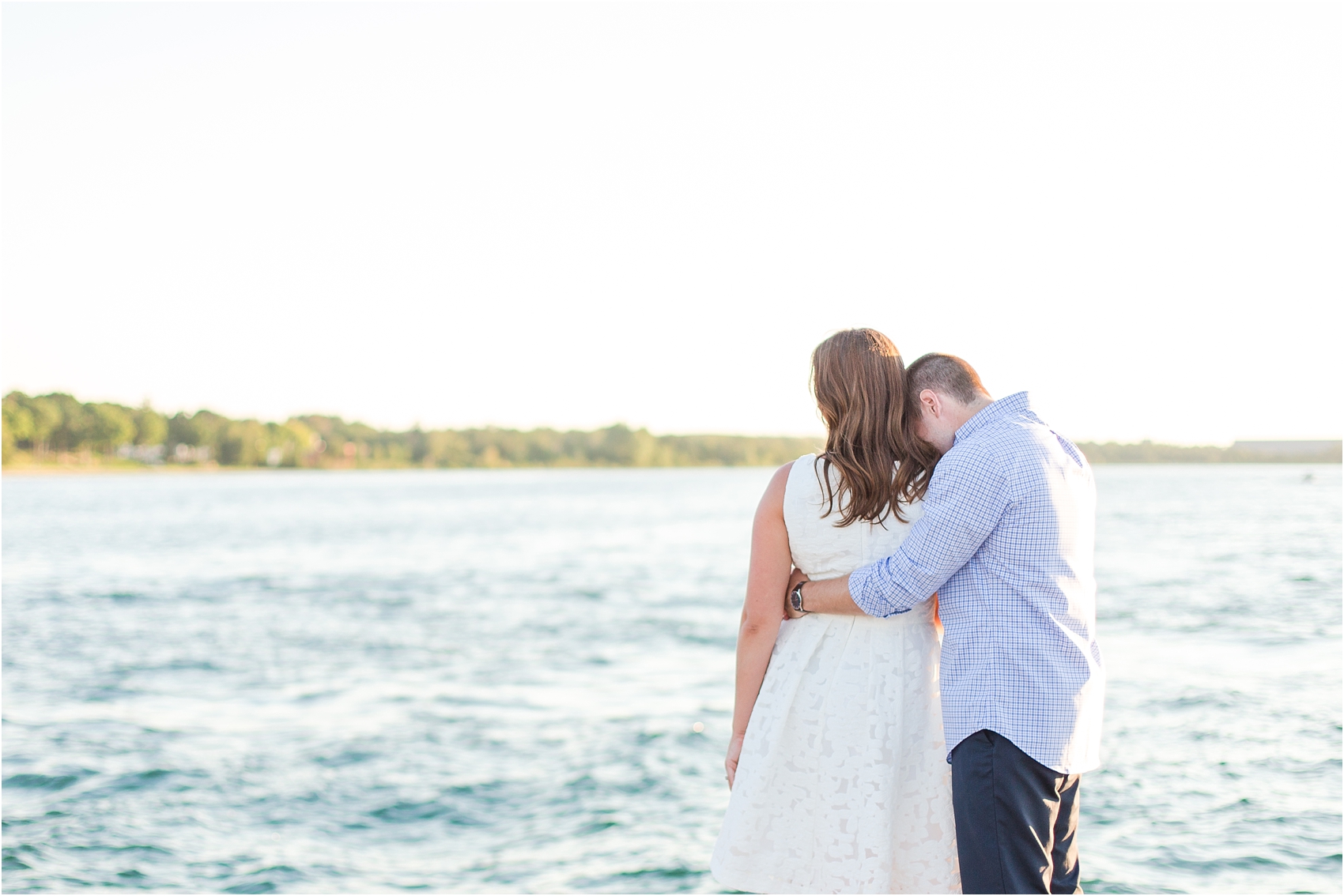 romantic-sunset-engagement-photos-at-the-lighthouse-in-charlevoix-mi-by-courtney-carolyn-photography_0015.jpg