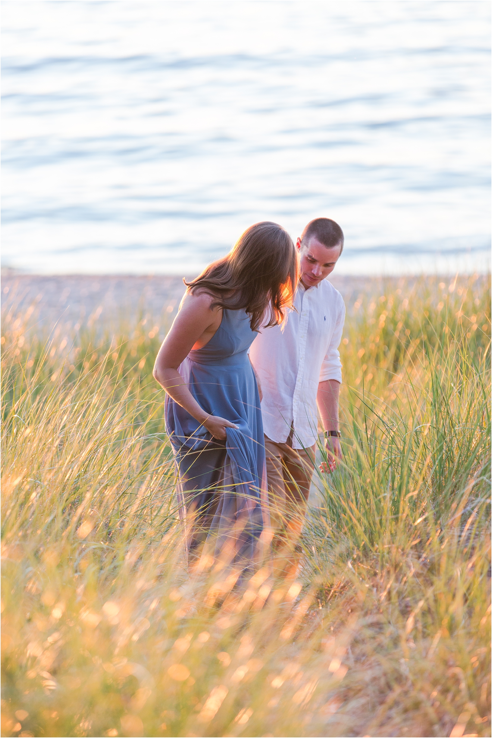 romantic-sunset-engagement-photos-at-michigan-beach-park-in-charlevoix-mi-by-courtney-carolyn-photography_0011.jpg