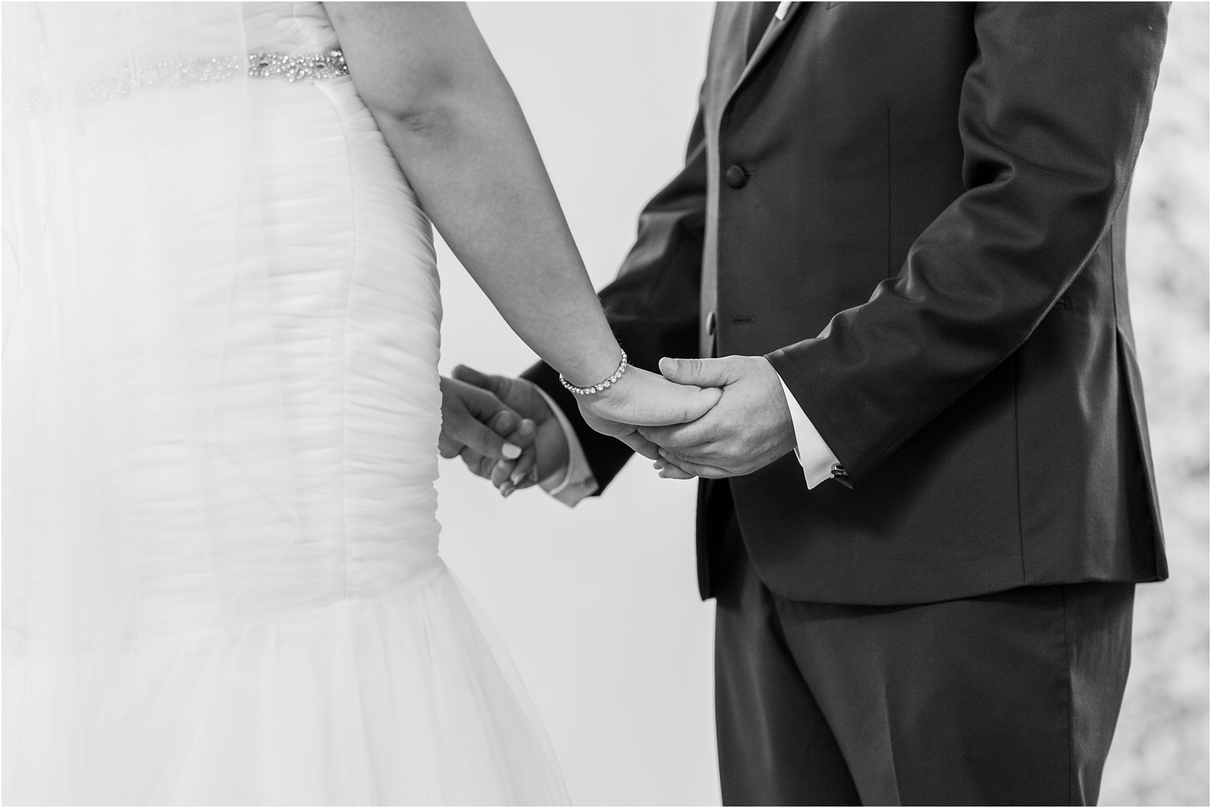 joyful-and-candid-navy-blush-wedding-photos-at-crystal-gardens-in-howell-mi-by-courtney-carolyn-photography_0038.jpg