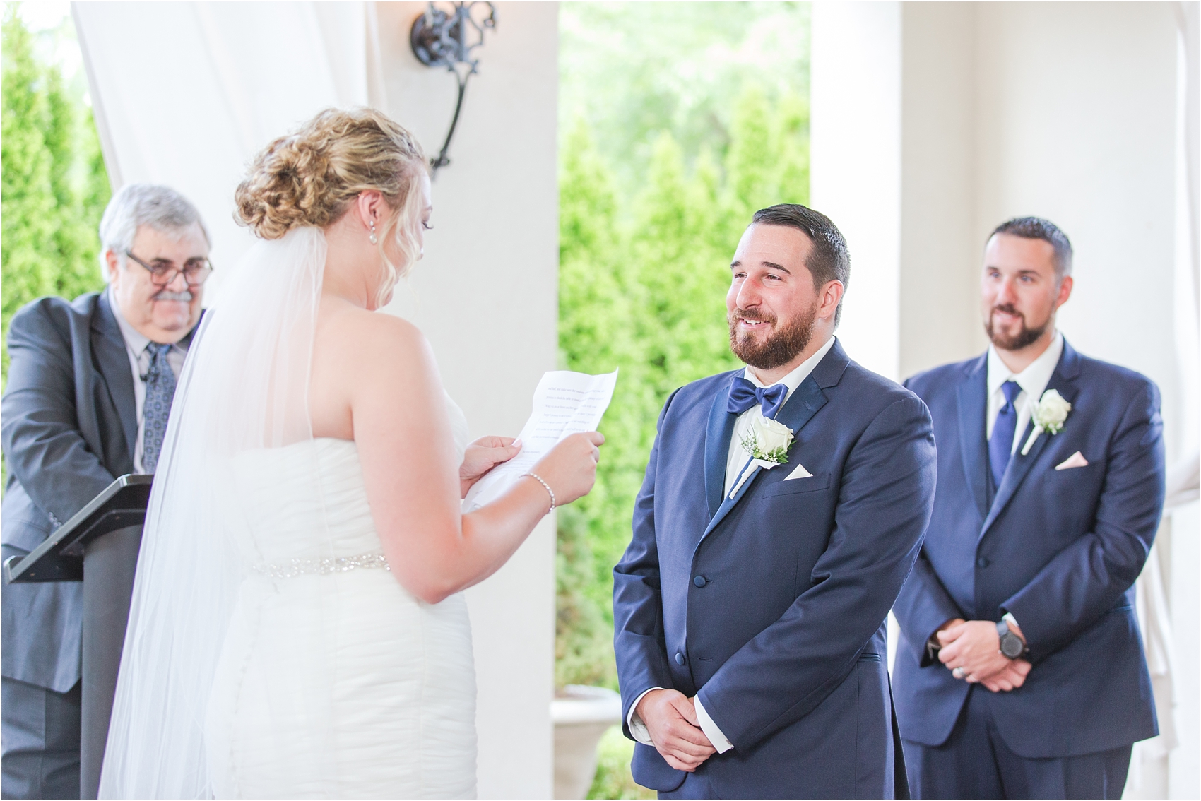 joyful-and-candid-navy-blush-wedding-photos-at-crystal-gardens-in-howell-mi-by-courtney-carolyn-photography_0043.jpg