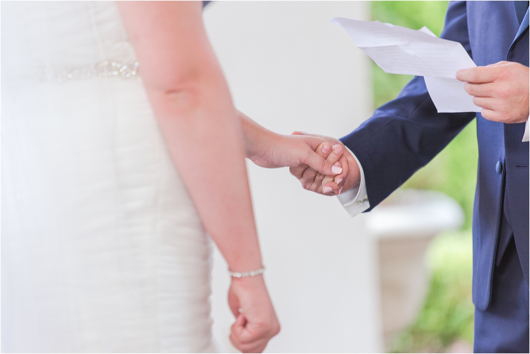 joyful-and-candid-navy-blush-wedding-photos-at-crystal-gardens-in-howell-mi-by-courtney-carolyn-photography_0049.jpg