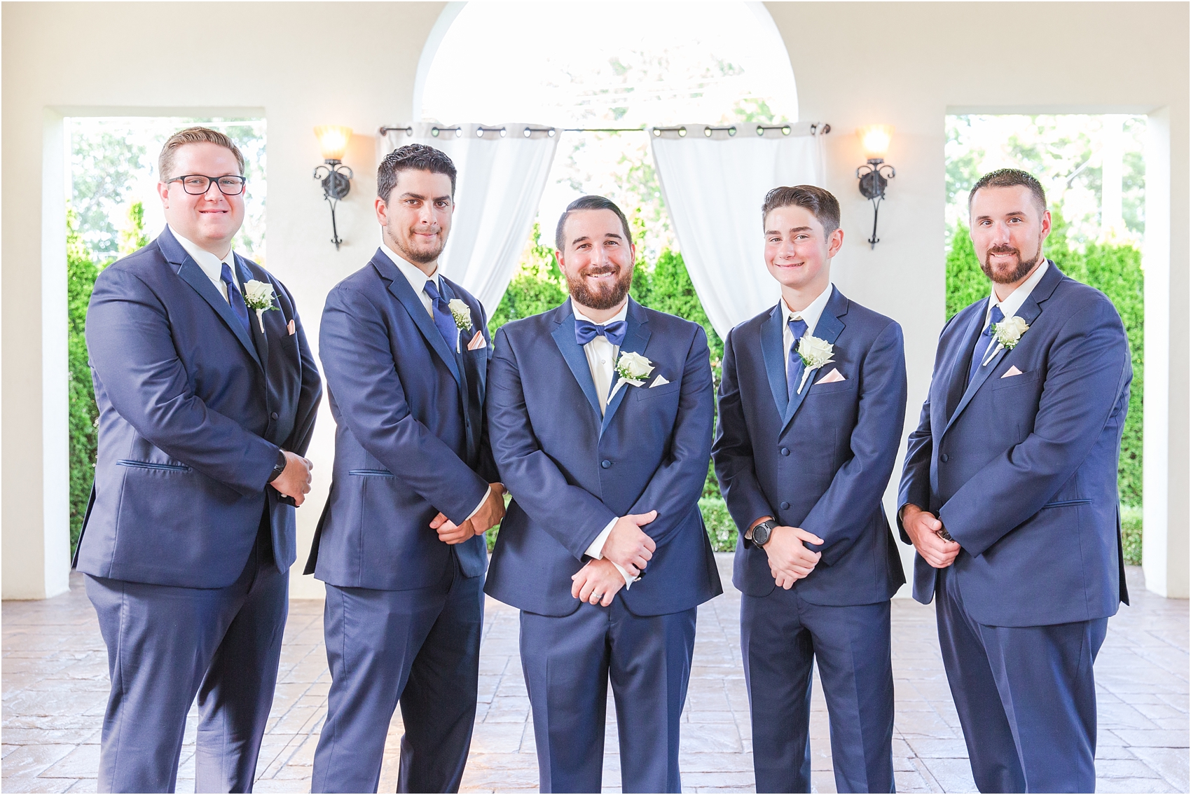 joyful-and-candid-navy-blush-wedding-photos-at-crystal-gardens-in-howell-mi-by-courtney-carolyn-photography_0065.jpg