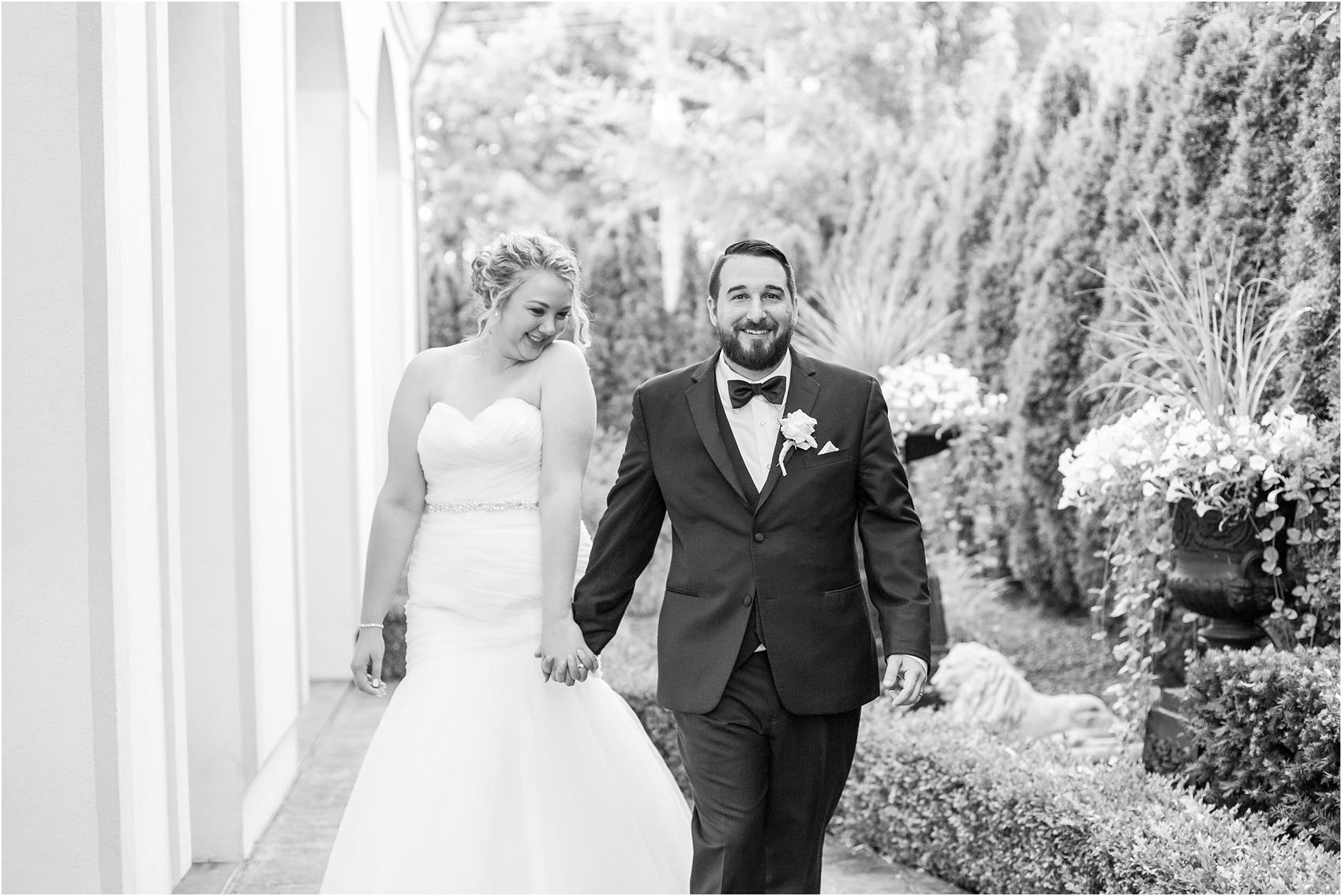 joyful-and-candid-navy-blush-wedding-photos-at-crystal-gardens-in-howell-mi-by-courtney-carolyn-photography_0098.jpg