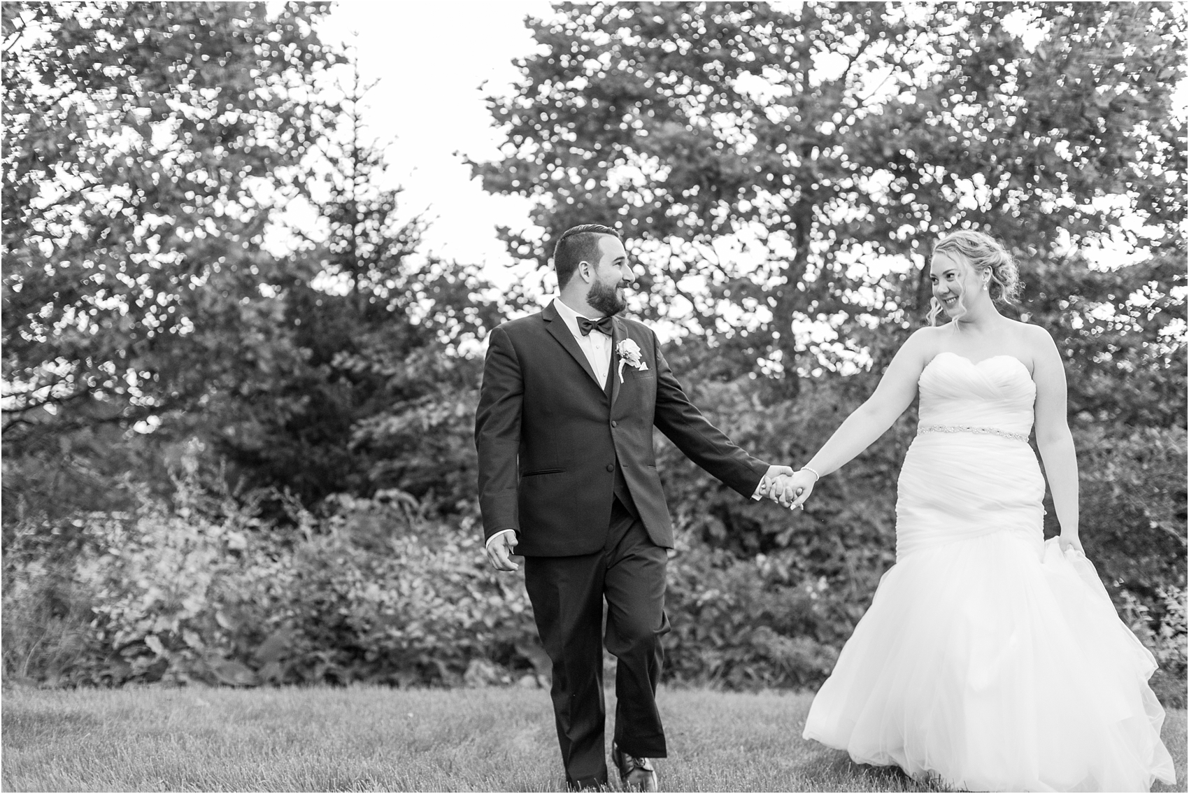joyful-and-candid-navy-blush-wedding-photos-at-crystal-gardens-in-howell-mi-by-courtney-carolyn-photography_0114.jpg