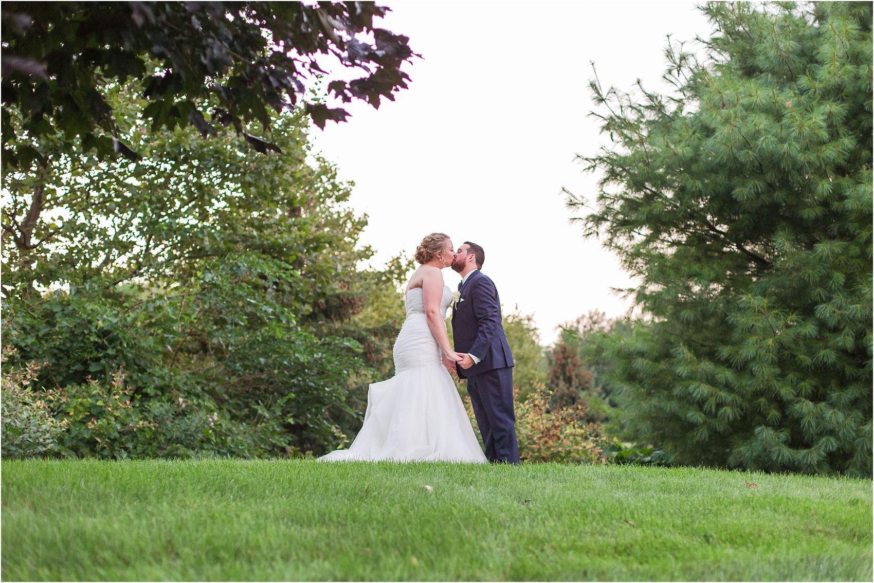 joyful-and-candid-navy-blush-wedding-photos-at-crystal-gardens-in-howell-mi-by-courtney-carolyn-photography_0117.jpg