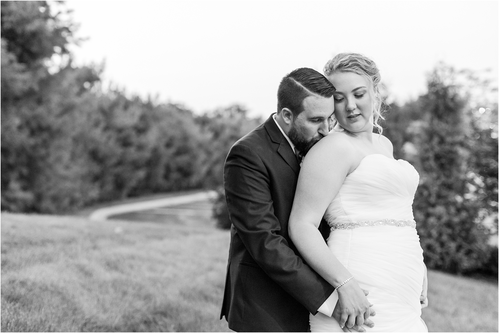 joyful-and-candid-navy-blush-wedding-photos-at-crystal-gardens-in-howell-mi-by-courtney-carolyn-photography_0118.jpg