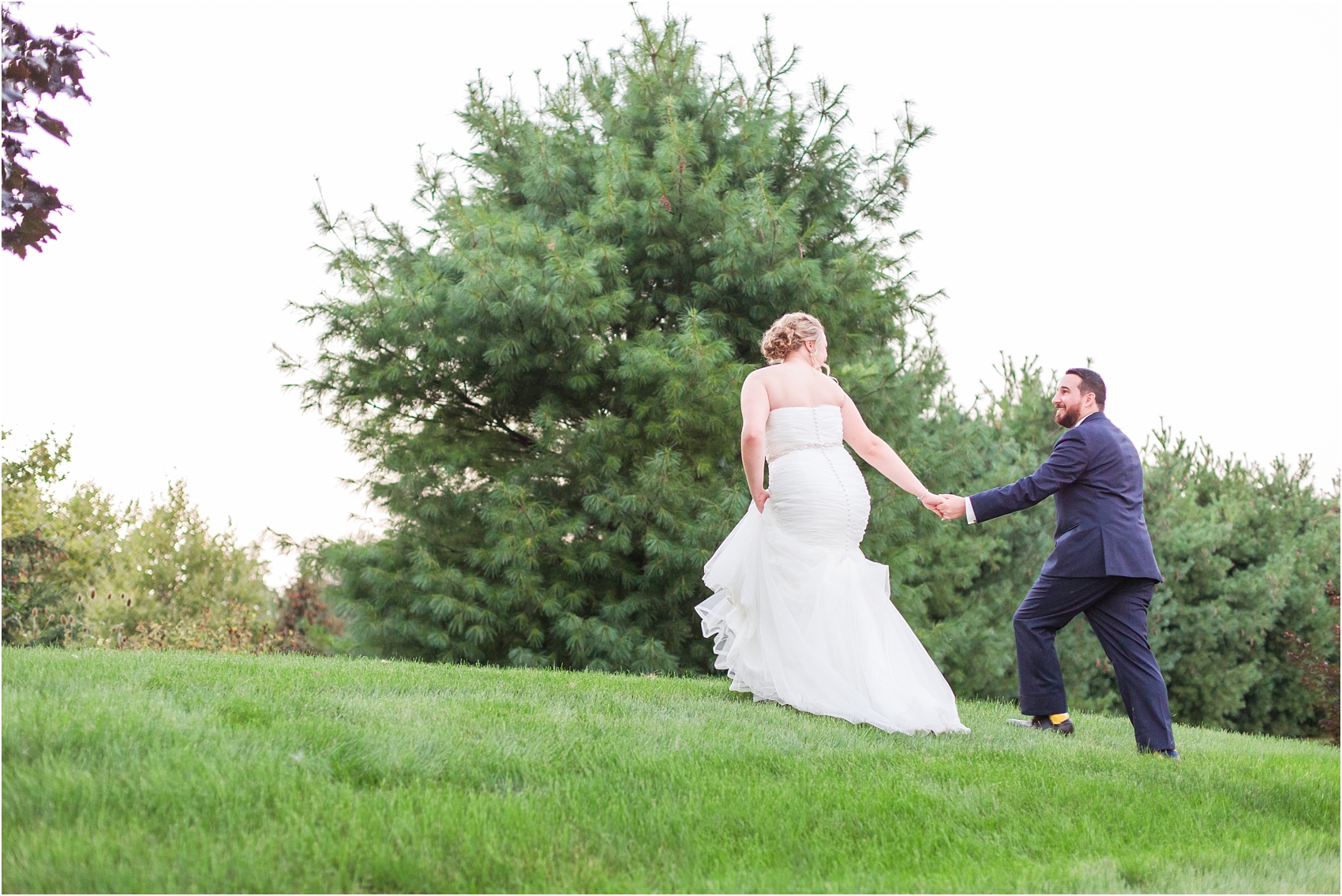 joyful-and-candid-navy-blush-wedding-photos-at-crystal-gardens-in-howell-mi-by-courtney-carolyn-photography_0119.jpg