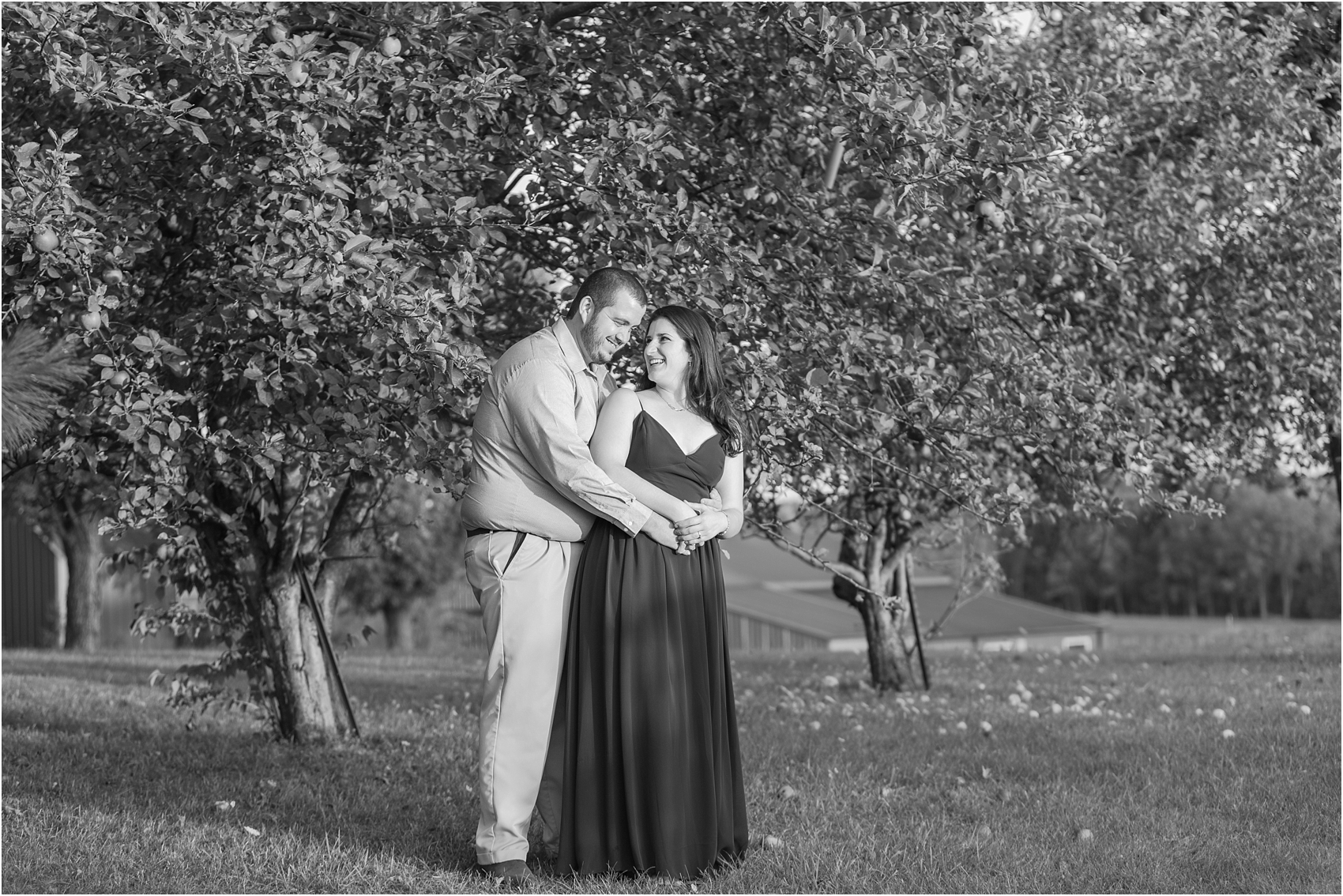 candid-romantic-summer-engagement-photos-at-hidden-lake-gardens-and-black-fire-winery-in-tipton-mi-by-courtney-carolyn-photography_0008.jpg