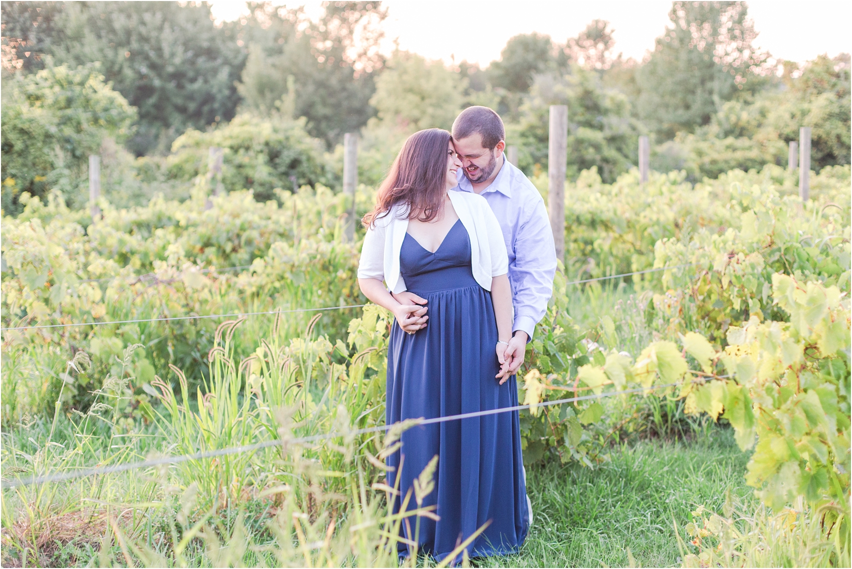candid-romantic-summer-engagement-photos-at-hidden-lake-gardens-and-black-fire-winery-in-tipton-mi-by-courtney-carolyn-photography_0015.jpg