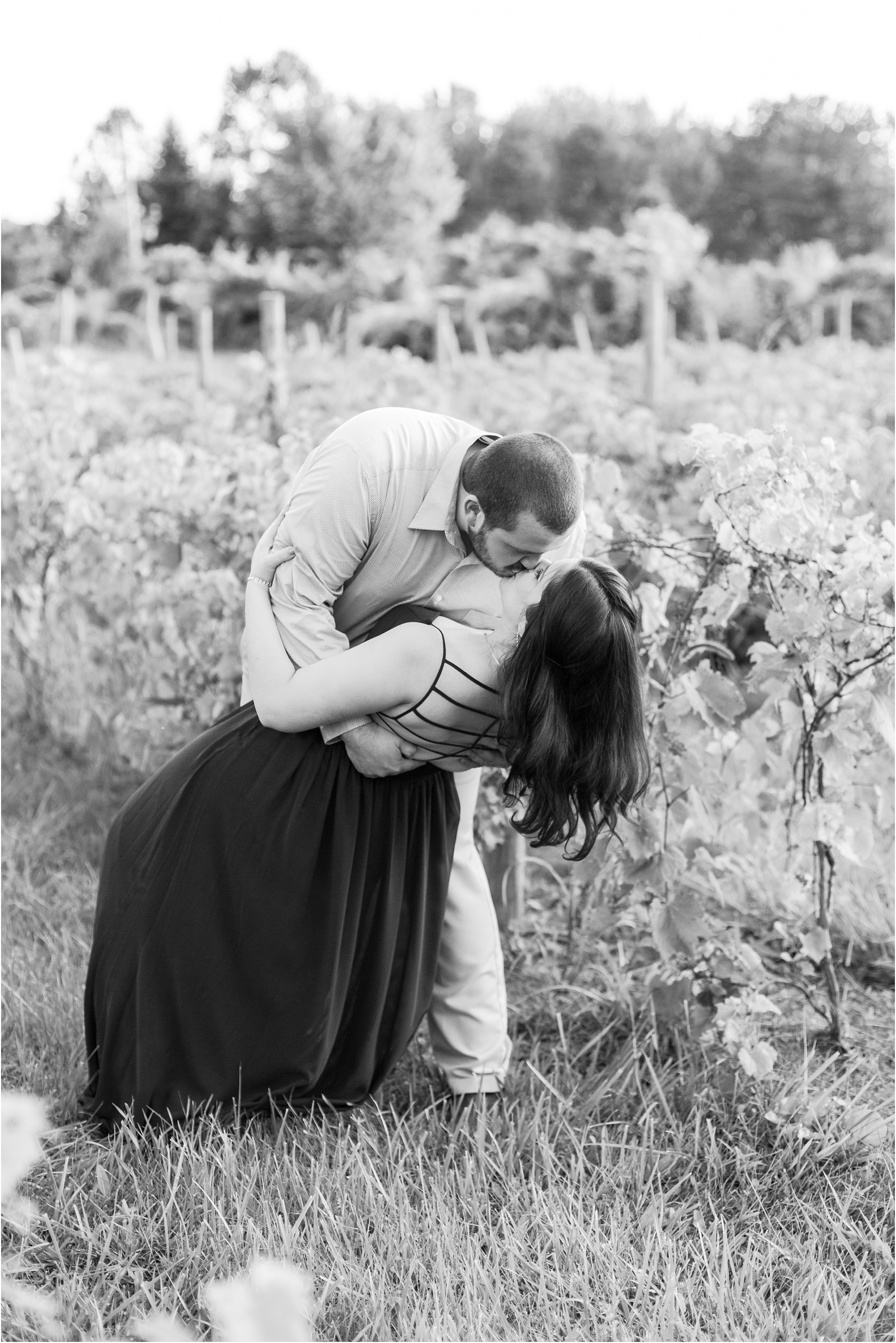 candid-romantic-summer-engagement-photos-at-hidden-lake-gardens-and-black-fire-winery-in-tipton-mi-by-courtney-carolyn-photography_0016.jpg