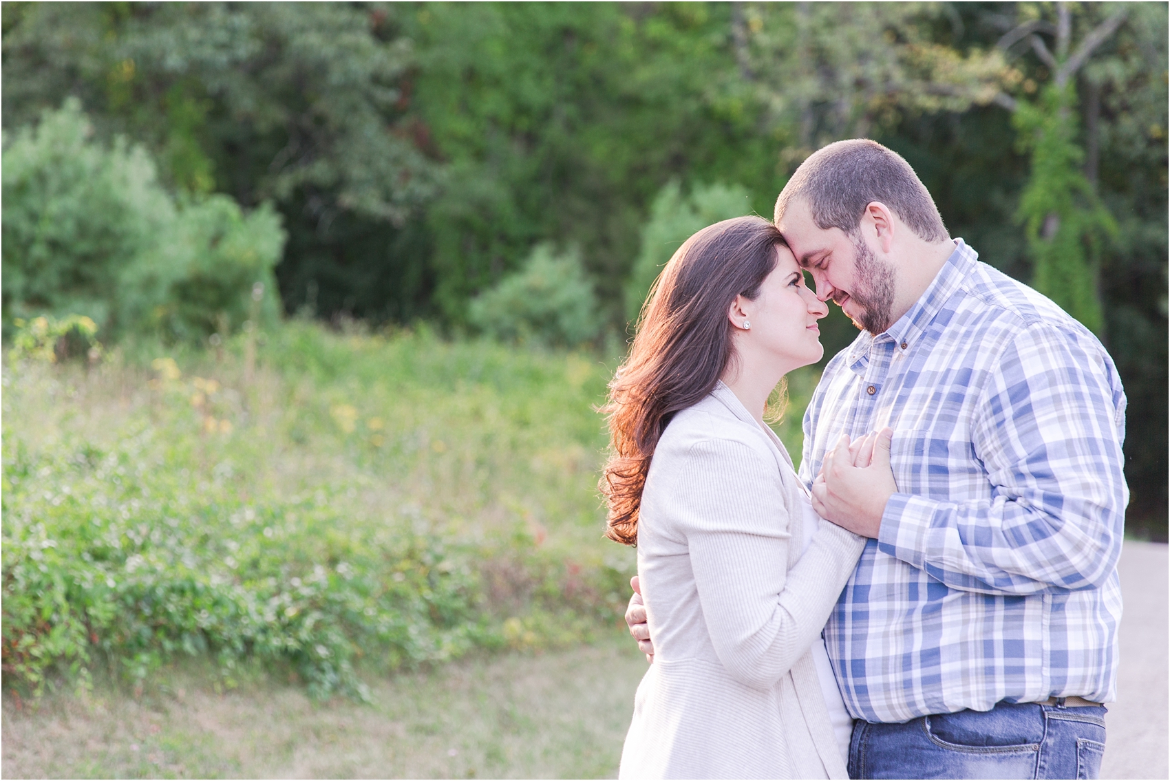 candid-romantic-summer-engagement-photos-at-hidden-lake-gardens-and-black-fire-winery-in-tipton-mi-by-courtney-carolyn-photography_0031.jpg