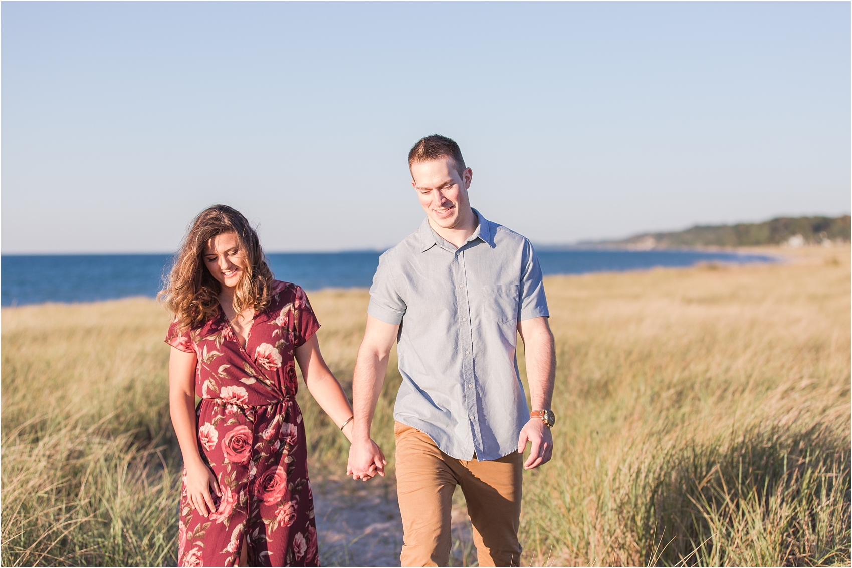 candid-end-of-summer-sunset-engagement-photos-at-silver-beach-in-st-joseph-mi-by-courtney-carolyn-photography_0007.jpg