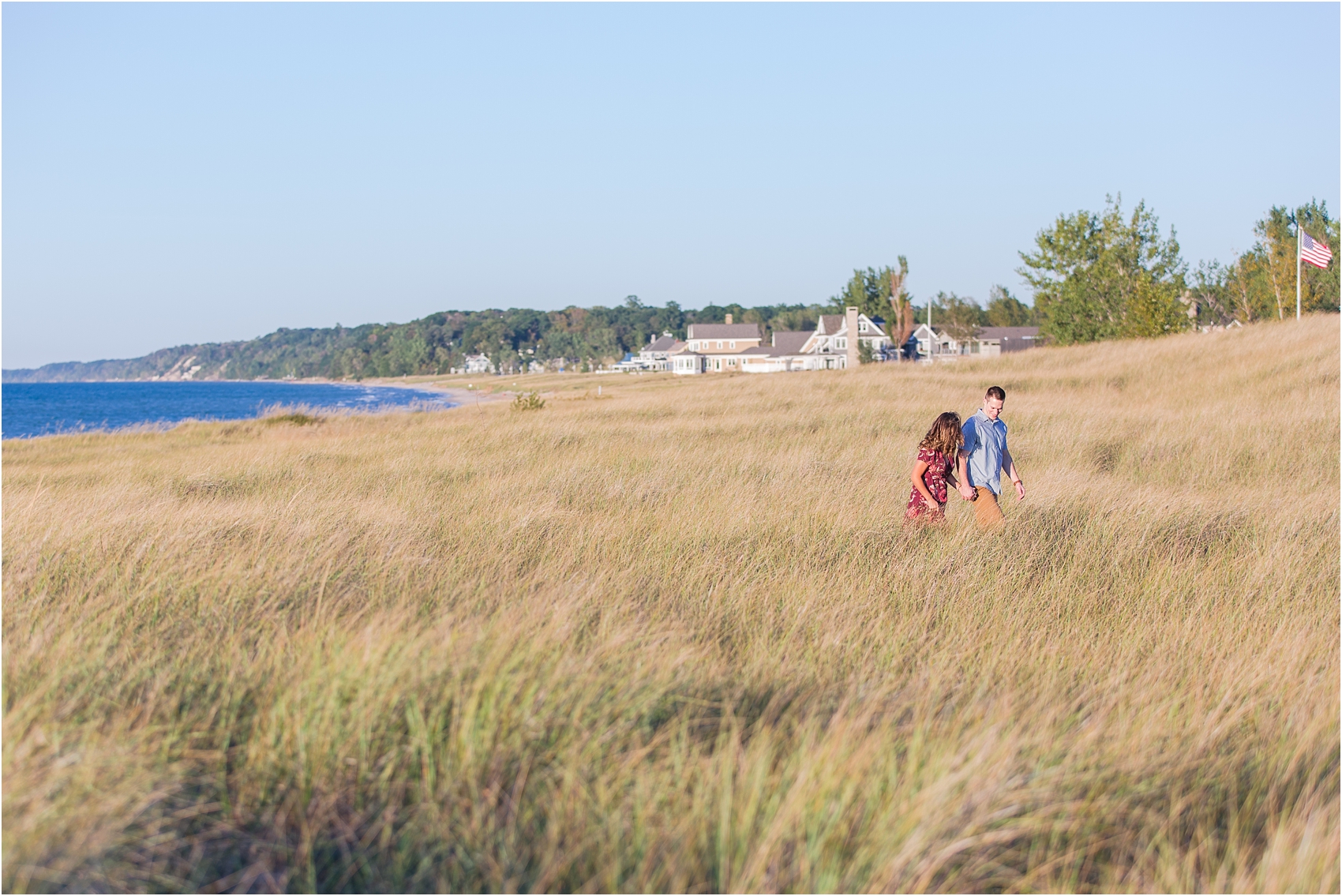 candid-end-of-summer-sunset-engagement-photos-at-silver-beach-in-st-joseph-mi-by-courtney-carolyn-photography_0010.jpg