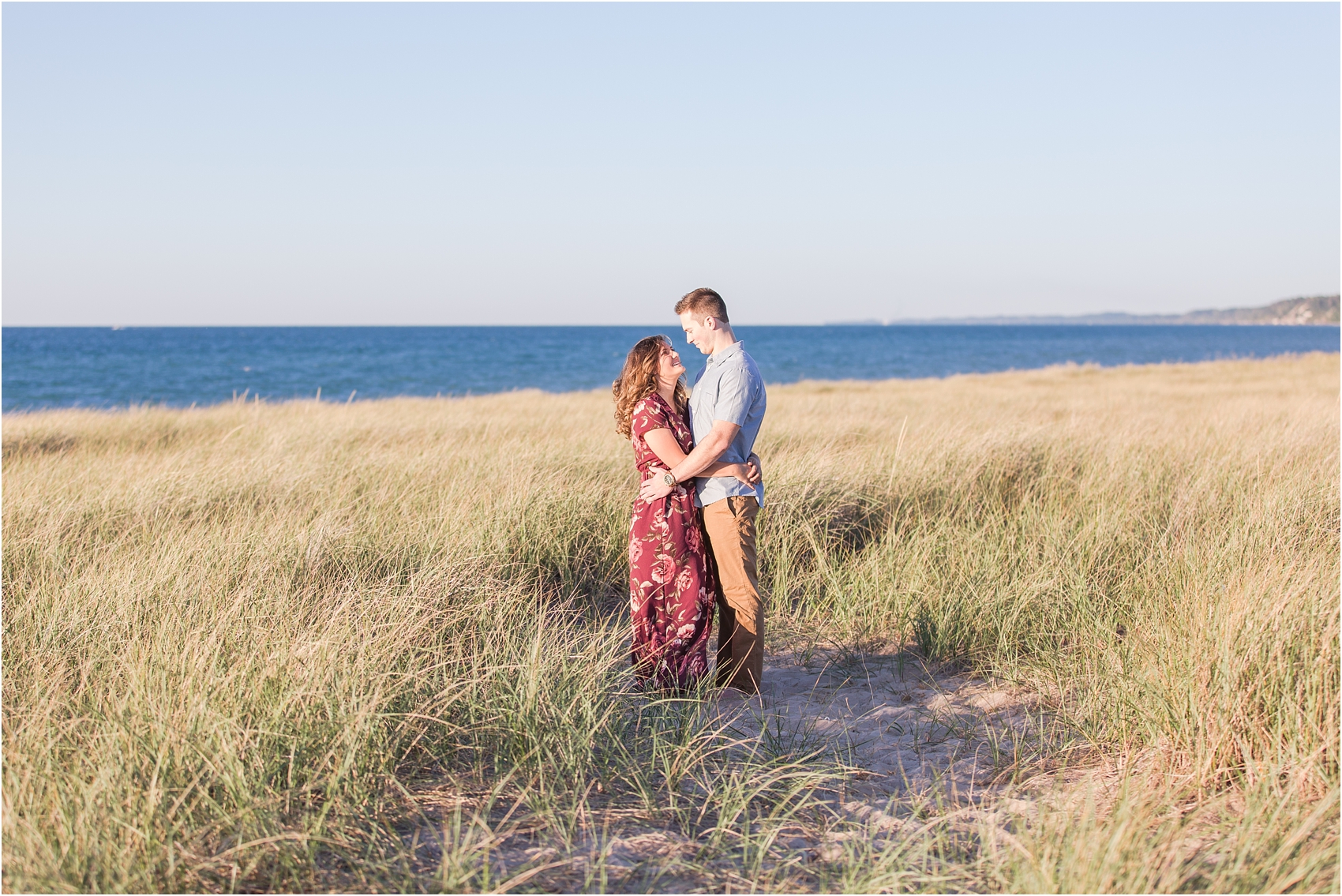 candid-end-of-summer-sunset-engagement-photos-at-silver-beach-in-st-joseph-mi-by-courtney-carolyn-photography_0023.jpg