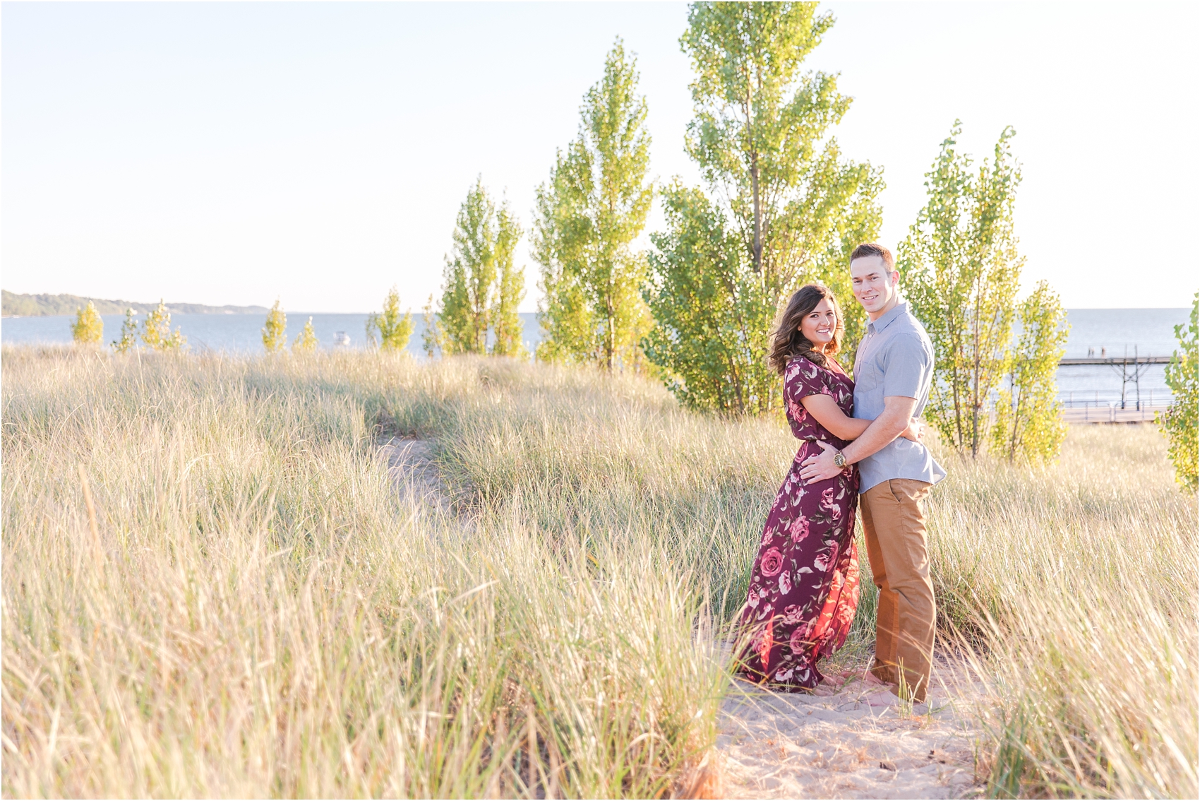 candid-end-of-summer-sunset-engagement-photos-at-silver-beach-in-st-joseph-mi-by-courtney-carolyn-photography_0025.jpg