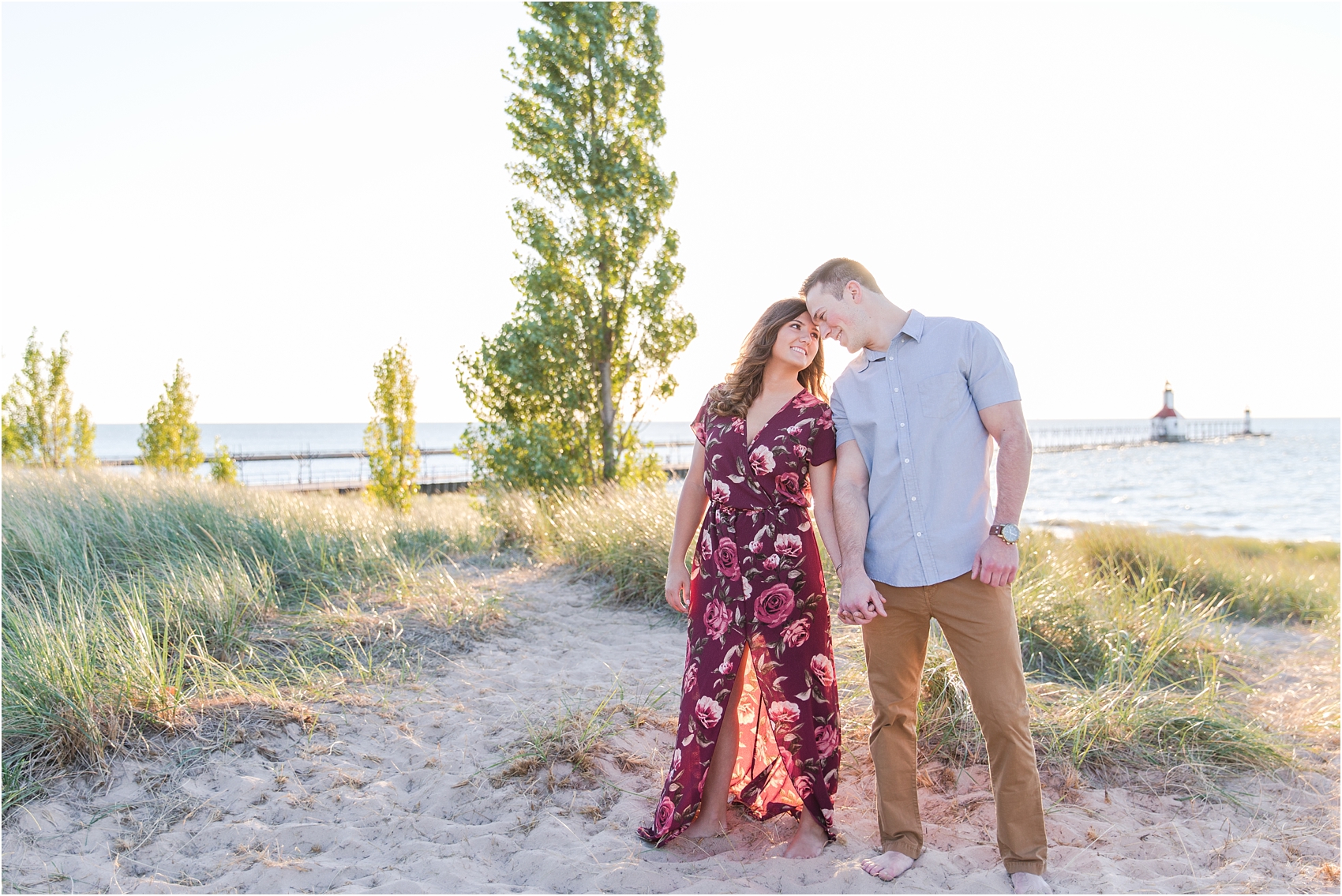 candid-end-of-summer-sunset-engagement-photos-at-silver-beach-in-st-joseph-mi-by-courtney-carolyn-photography_0029.jpg