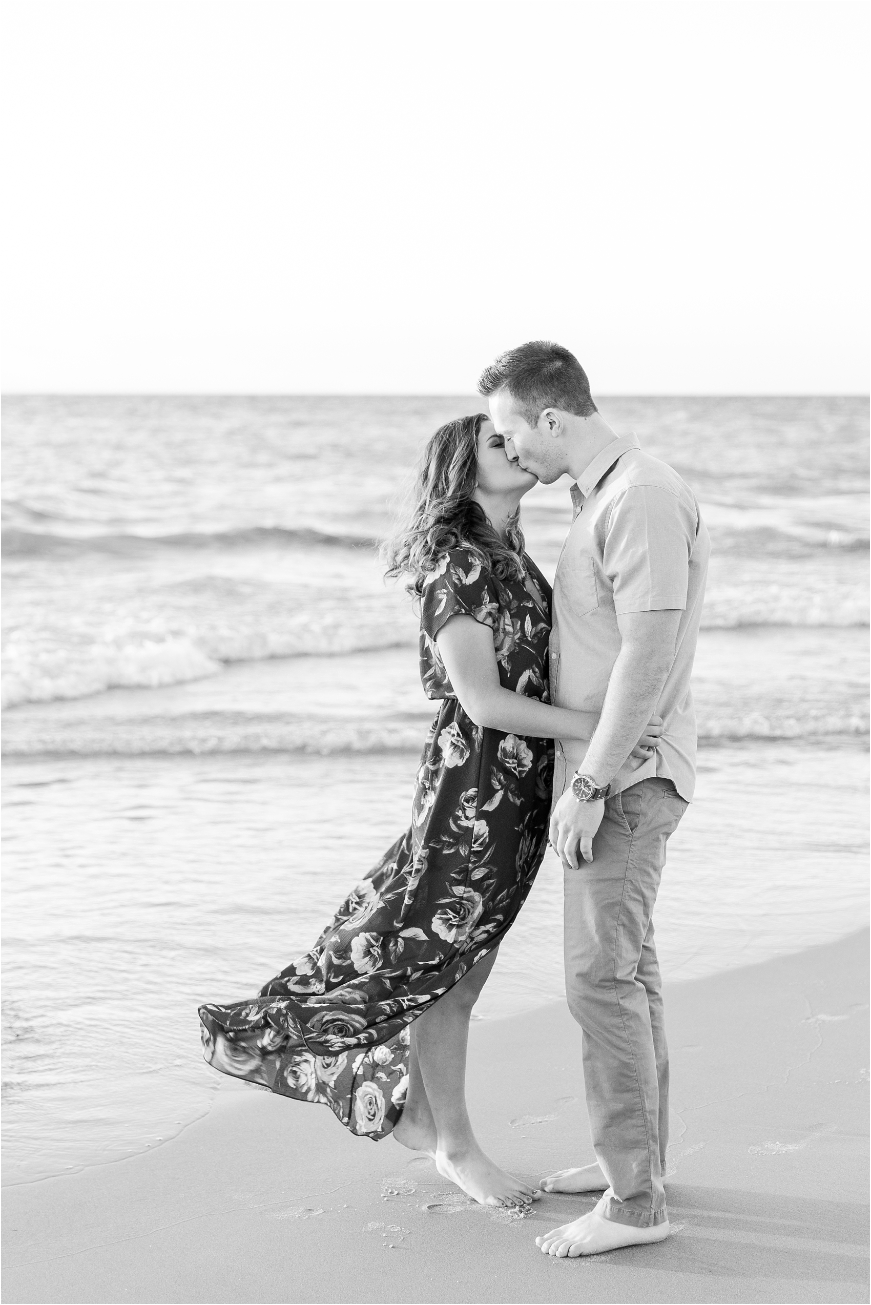 candid-end-of-summer-sunset-engagement-photos-at-silver-beach-in-st-joseph-mi-by-courtney-carolyn-photography_0030.jpg