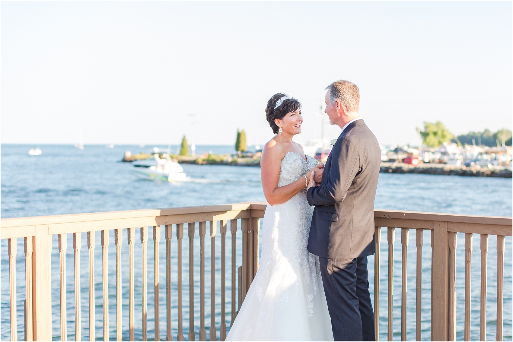 classic-natuical-inspired-wedding-photos-on-infinity-ovation-yacht-in-st-clair-shores-mi-by-courtney-carolyn-photography_0056.jpg