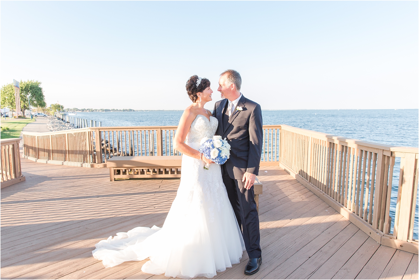 classic-natuical-inspired-wedding-photos-on-infinity-ovation-yacht-in-st-clair-shores-mi-by-courtney-carolyn-photography_0062.jpg