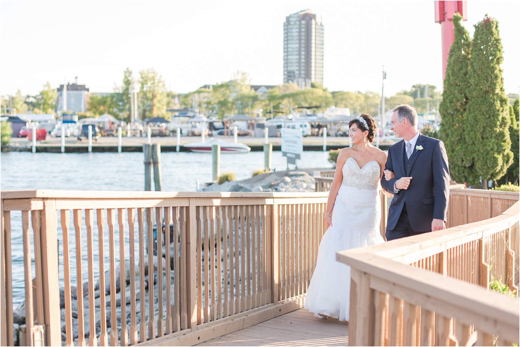 classic-natuical-inspired-wedding-photos-on-infinity-ovation-yacht-in-st-clair-shores-mi-by-courtney-carolyn-photography_0069.jpg