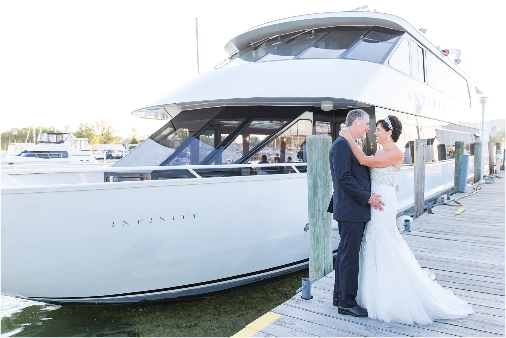 classic-natuical-inspired-wedding-photos-on-infinity-ovation-yacht-in-st-clair-shores-mi-by-courtney-carolyn-photography_0073.jpg