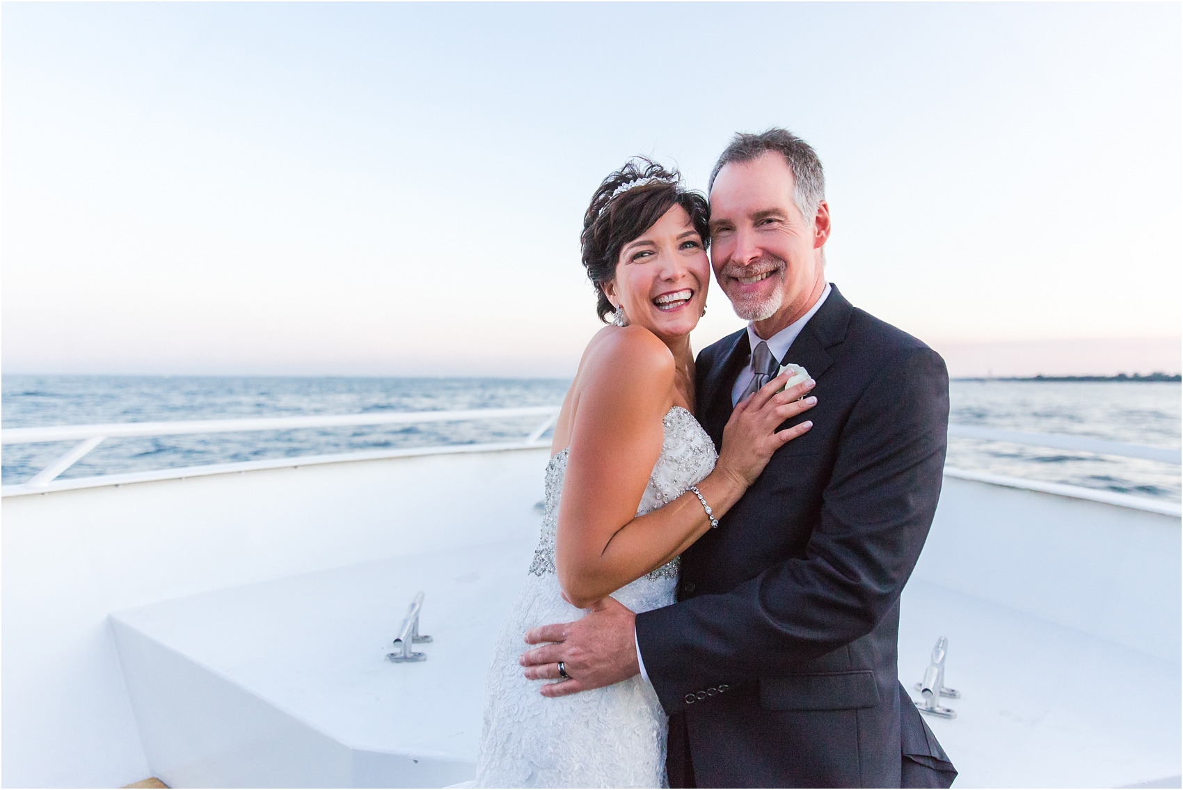 classic-natuical-inspired-wedding-photos-on-infinity-ovation-yacht-in-st-clair-shores-mi-by-courtney-carolyn-photography_0075.jpg