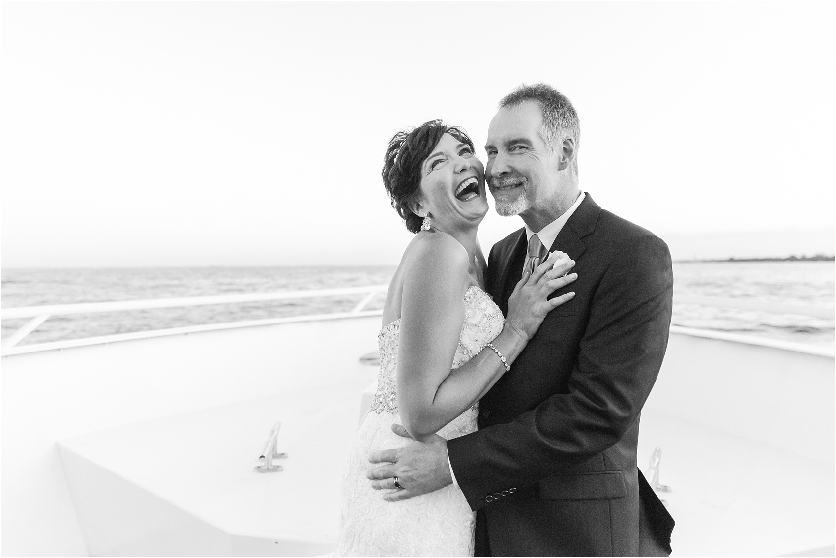 classic-natuical-inspired-wedding-photos-on-infinity-ovation-yacht-in-st-clair-shores-mi-by-courtney-carolyn-photography_0079.jpg
