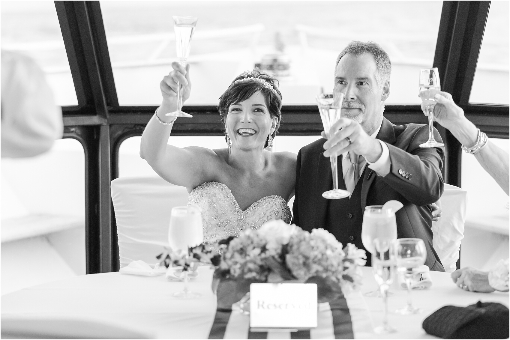 classic-natuical-inspired-wedding-photos-on-infinity-ovation-yacht-in-st-clair-shores-mi-by-courtney-carolyn-photography_0085.jpg