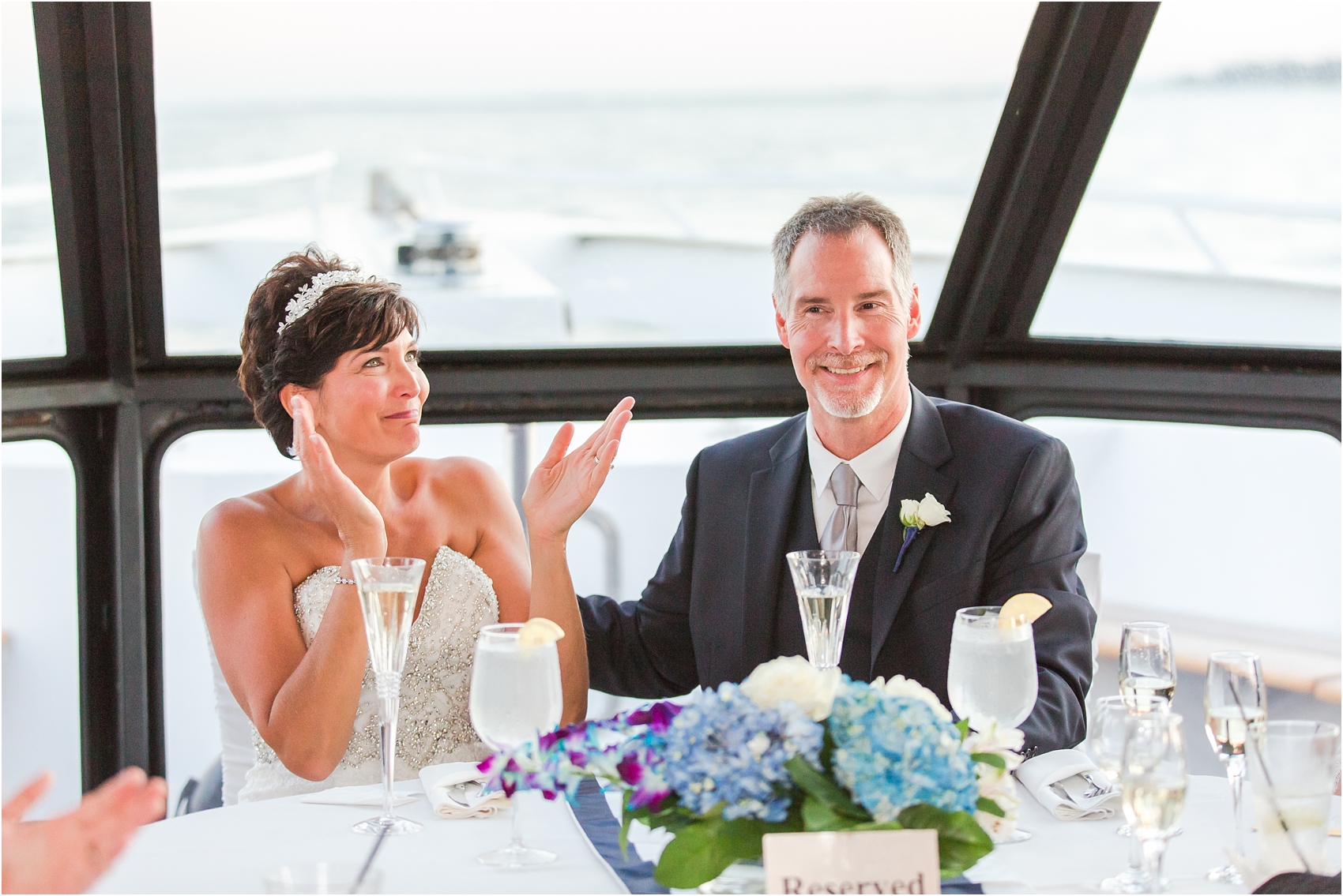 classic-natuical-inspired-wedding-photos-on-infinity-ovation-yacht-in-st-clair-shores-mi-by-courtney-carolyn-photography_0088.jpg