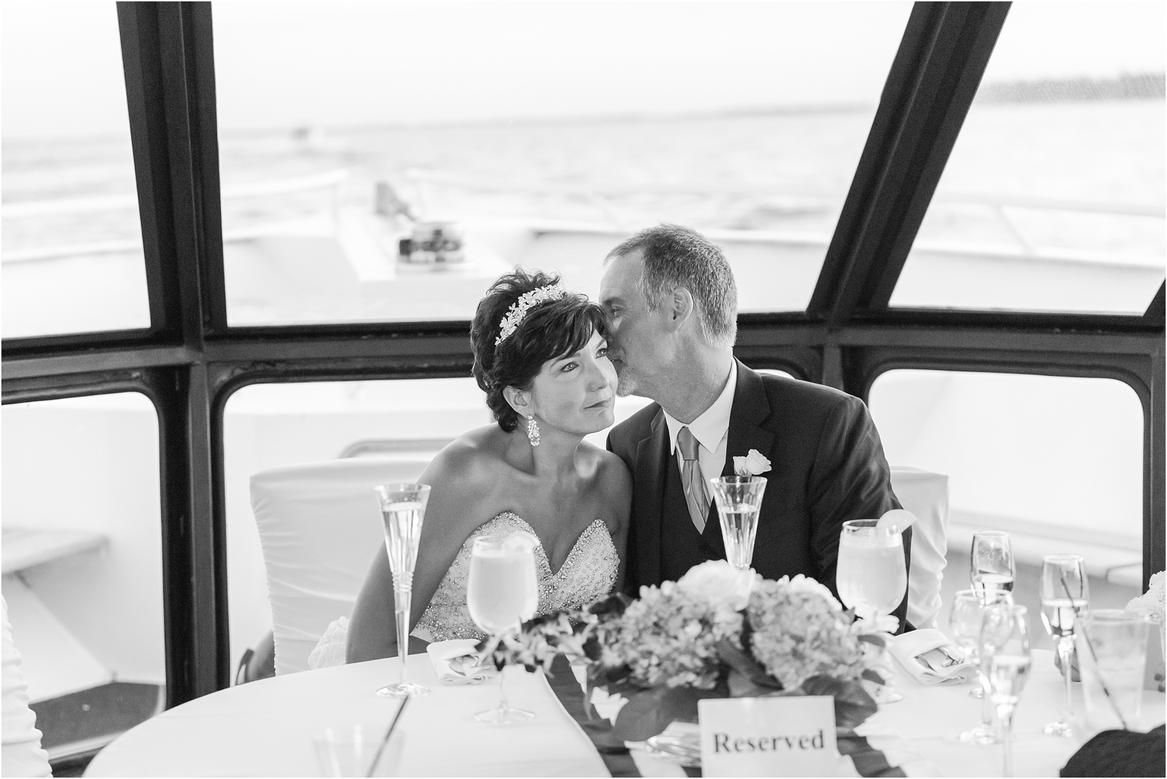classic-natuical-inspired-wedding-photos-on-infinity-ovation-yacht-in-st-clair-shores-mi-by-courtney-carolyn-photography_0095.jpg