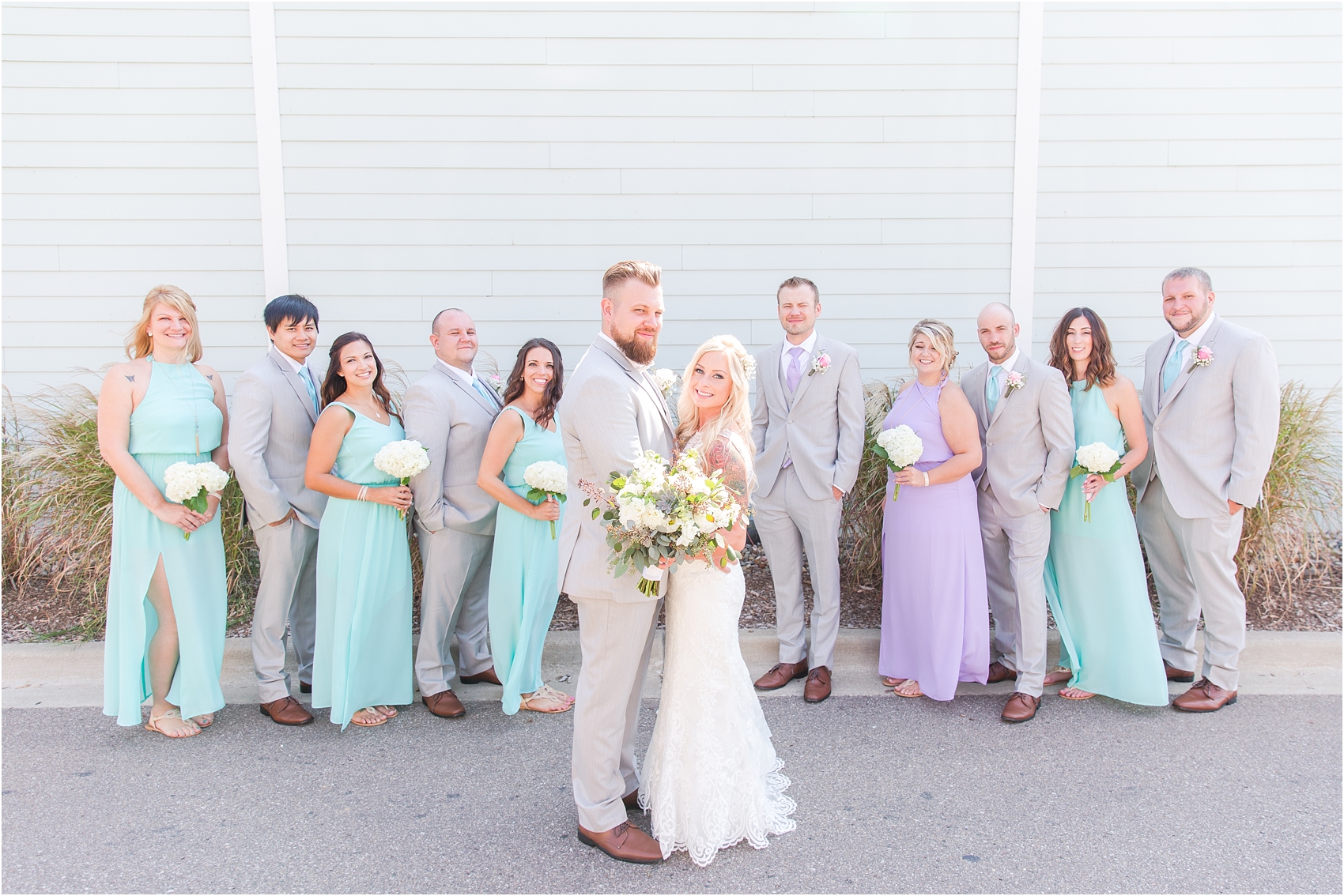 fun-whimsical-beach-wedding-photos-in-st-joseph-michigan-by-courtney-carolyn-photography_0031.jpg