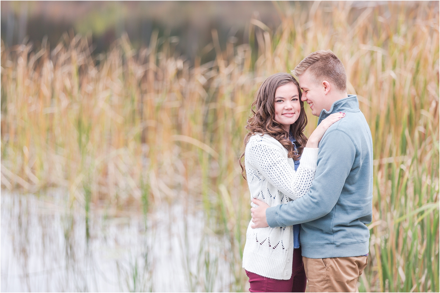 colorful-fall-engagement-photos-at-the-lake-at-huron-meadows-metropark-in-brighton-michigan-by-courtney-carolyn-photography_0024.jpg