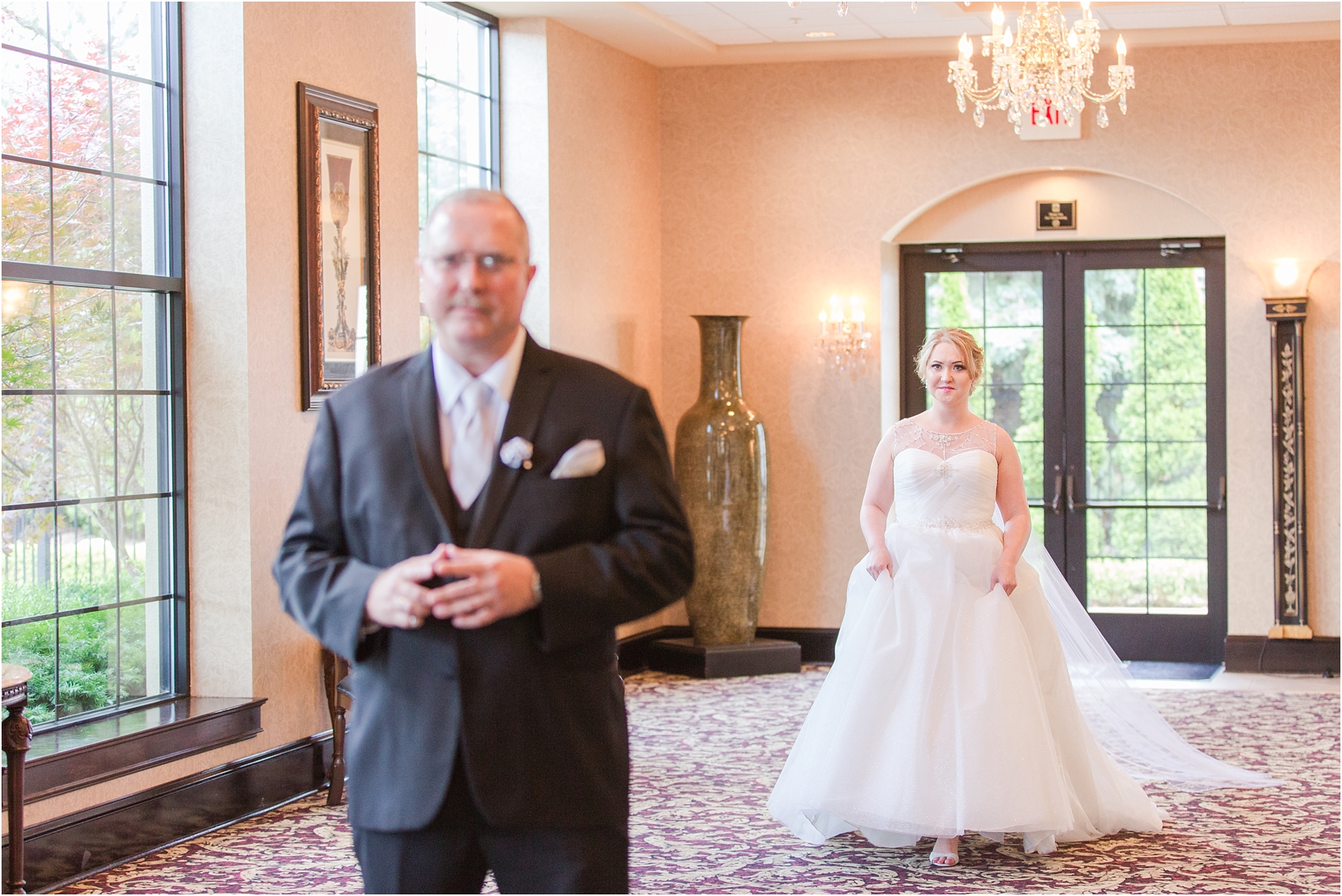 father-and-bride-share-emotional-first-look-on-wedding-day-photos-in-detroit-michigan-by-courtney-carolyn-photography_0001.jpg