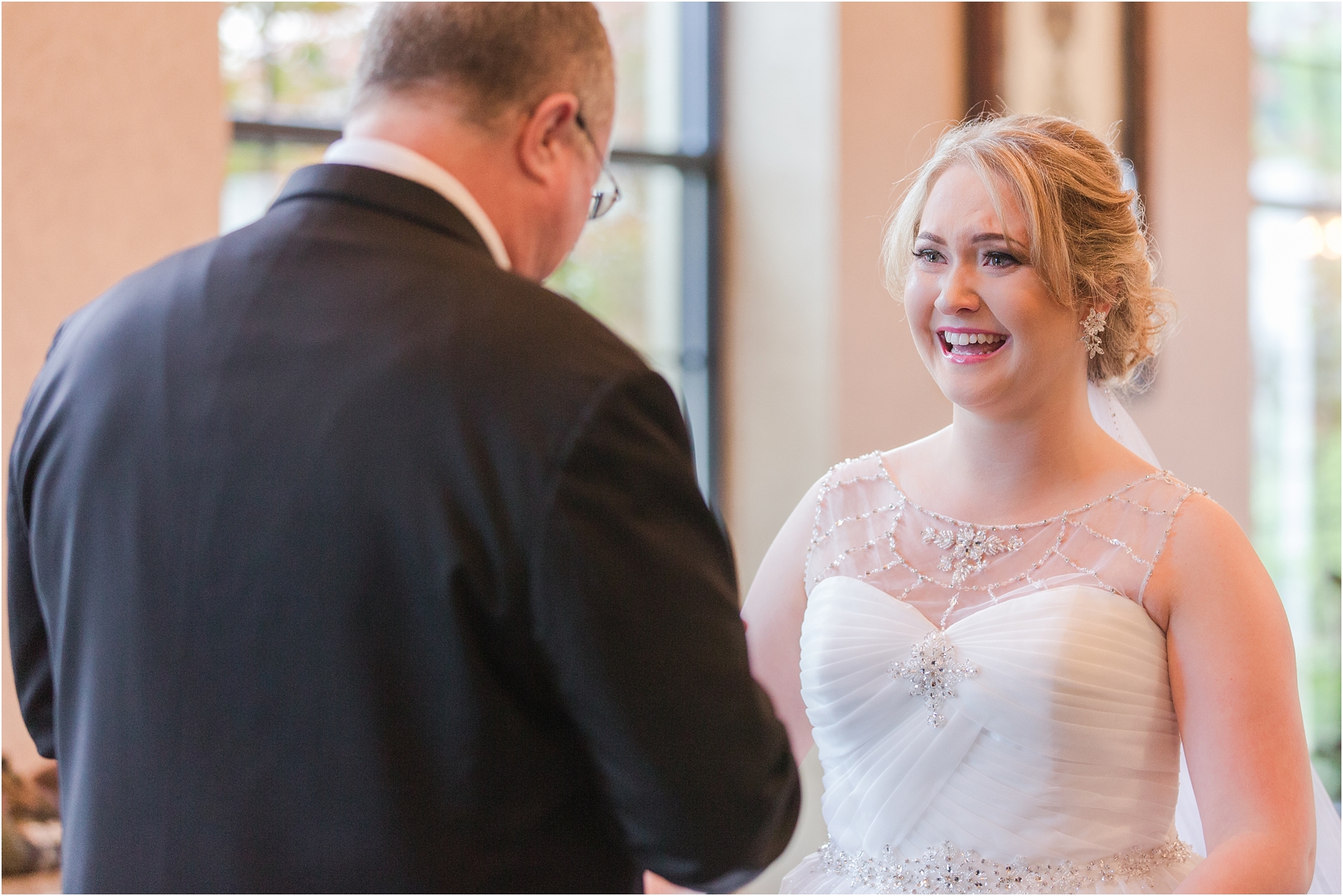 father-and-bride-share-emotional-first-look-on-wedding-day-photos-in-detroit-michigan-by-courtney-carolyn-photography_0005.jpg