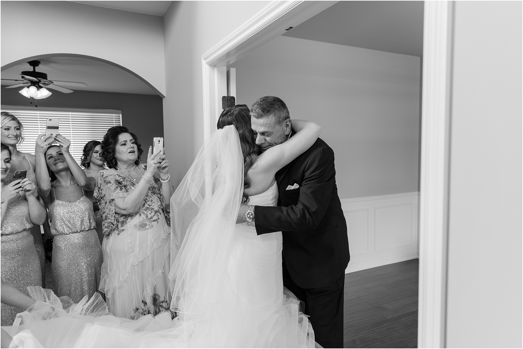 father-and-bride-share-emotional-first-look-on-wedding-day-photos-in-detroit-michigan-by-courtney-carolyn-photography_0016.jpg