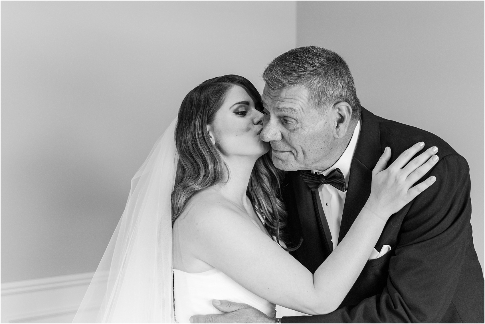 father-and-bride-share-emotional-first-look-on-wedding-day-photos-in-detroit-michigan-by-courtney-carolyn-photography_0021.jpg