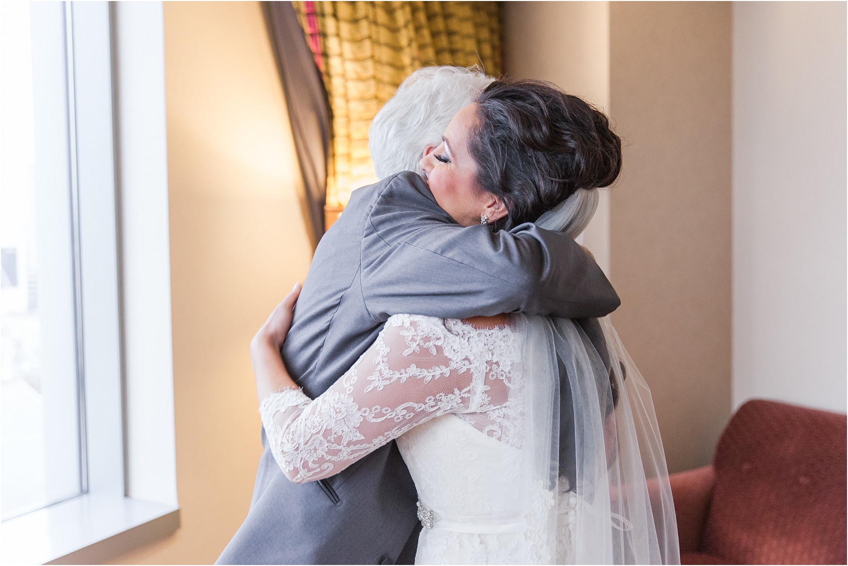 father-and-bride-share-emotional-first-look-on-wedding-day-photos-in-detroit-michigan-by-courtney-carolyn-photography_0035.jpg