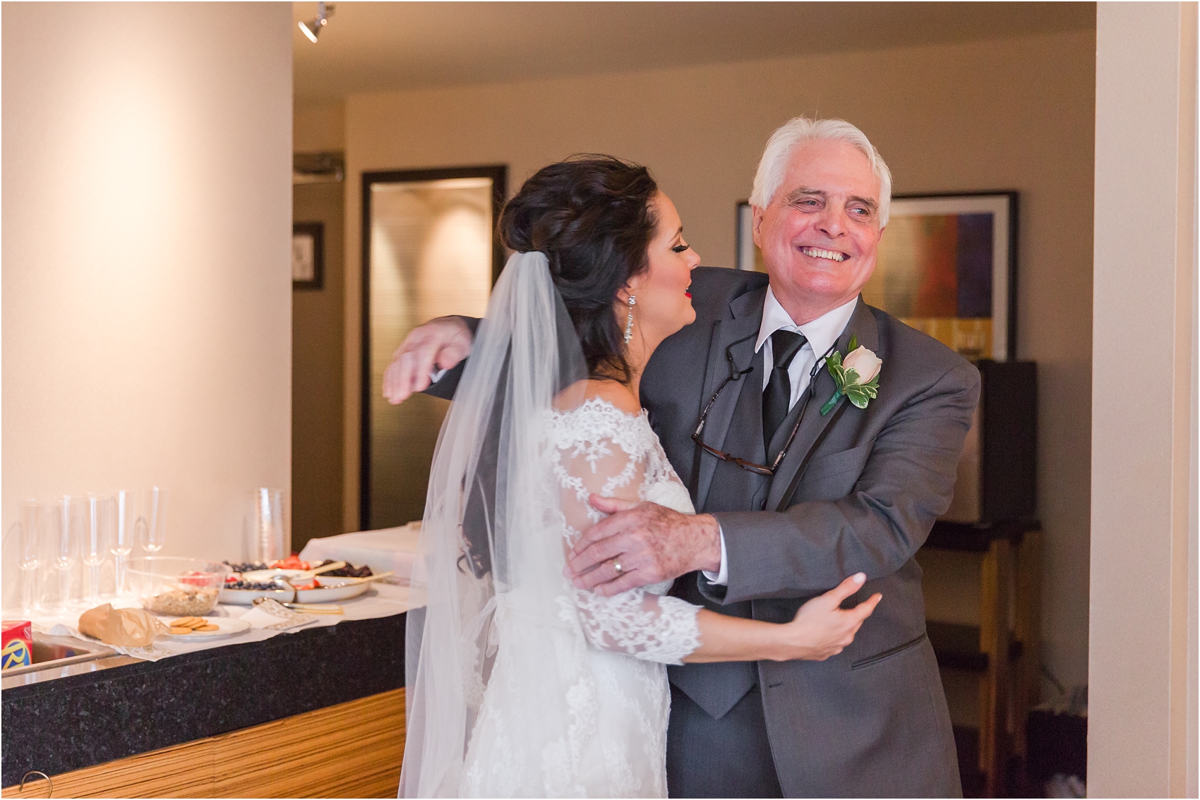 father-and-bride-share-emotional-first-look-on-wedding-day-photos-in-detroit-michigan-by-courtney-carolyn-photography_0038.jpg
