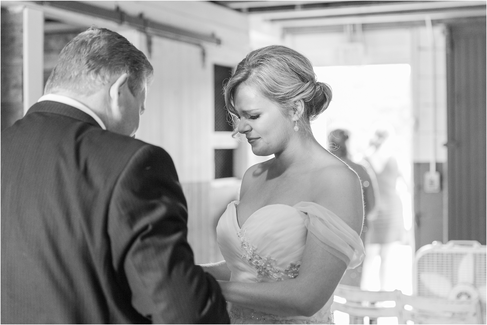 father-and-bride-share-emotional-first-look-on-wedding-day-photos-in-detroit-michigan-by-courtney-carolyn-photography_0044.jpg