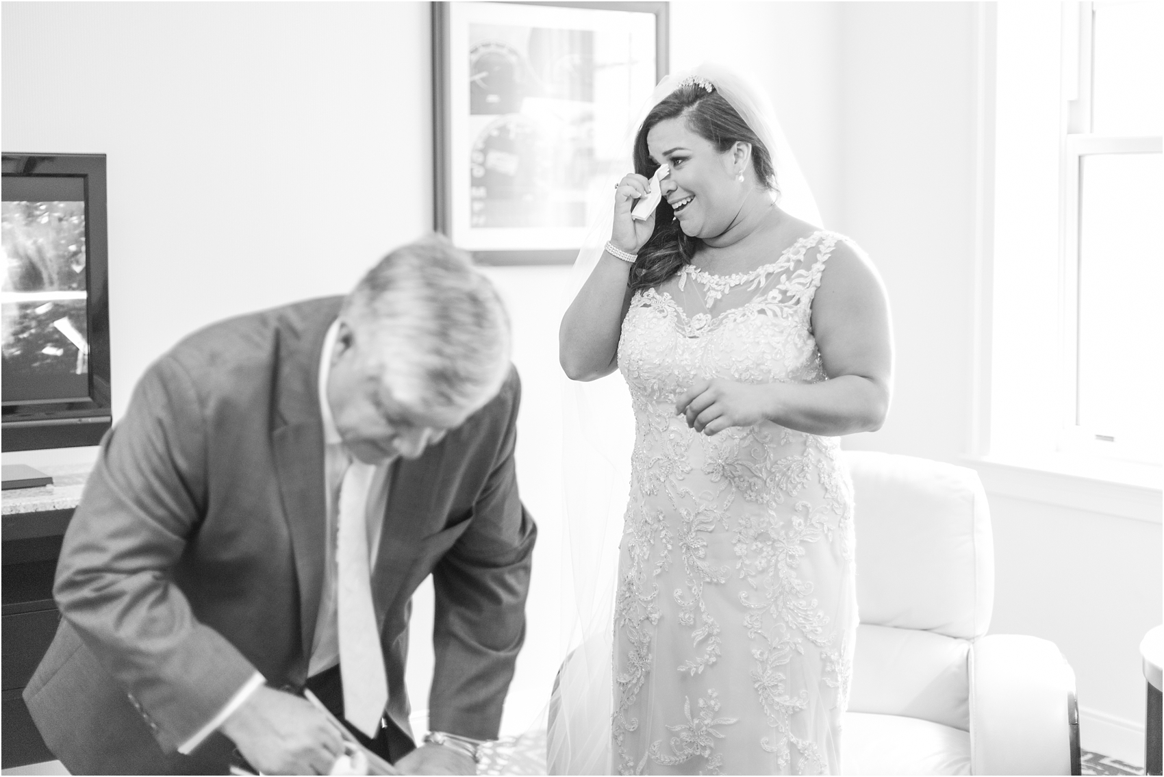 father-and-bride-share-emotional-first-look-on-wedding-day-photos-in-detroit-michigan-by-courtney-carolyn-photography_0050.jpg