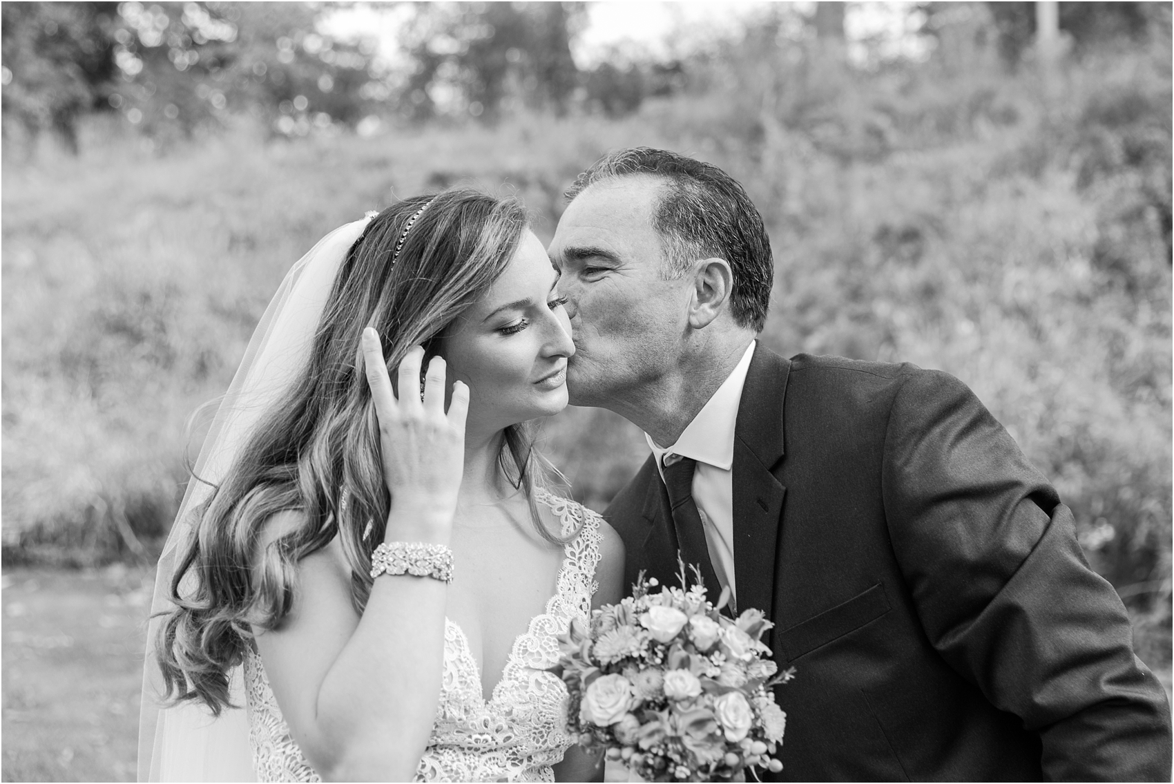 father-and-bride-share-emotional-first-look-on-wedding-day-photos-in-detroit-michigan-by-courtney-carolyn-photography_0070.jpg