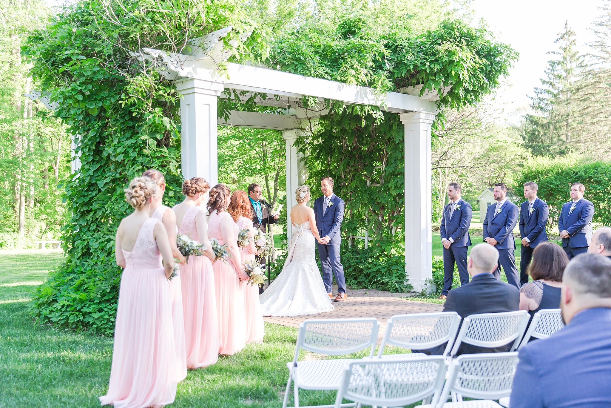 fun-candid-laid-back-wedding-photos-at-wellers-carriage-house-in-saline-michigan-and-at-the-eagle-crest-golf-resort-by-courtney-carolyn-photography_0067.jpg