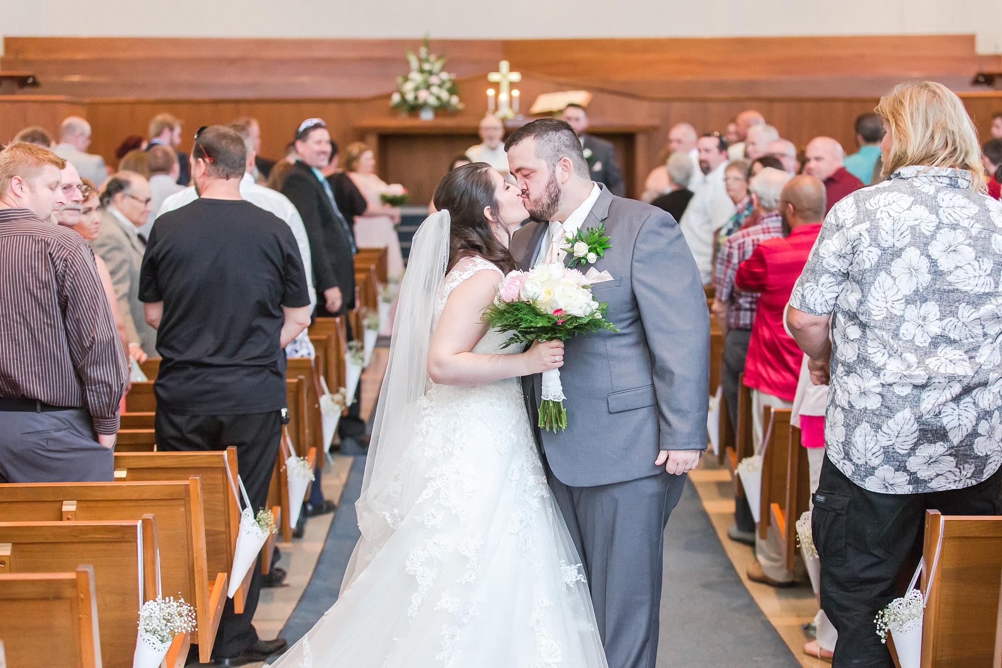 emotional-laid-back-romantic-wedding-photos-at-adrian-college-herrick-chapel-in-adrian-michigan-by-courtney-carolyn-photography_0032.jpg