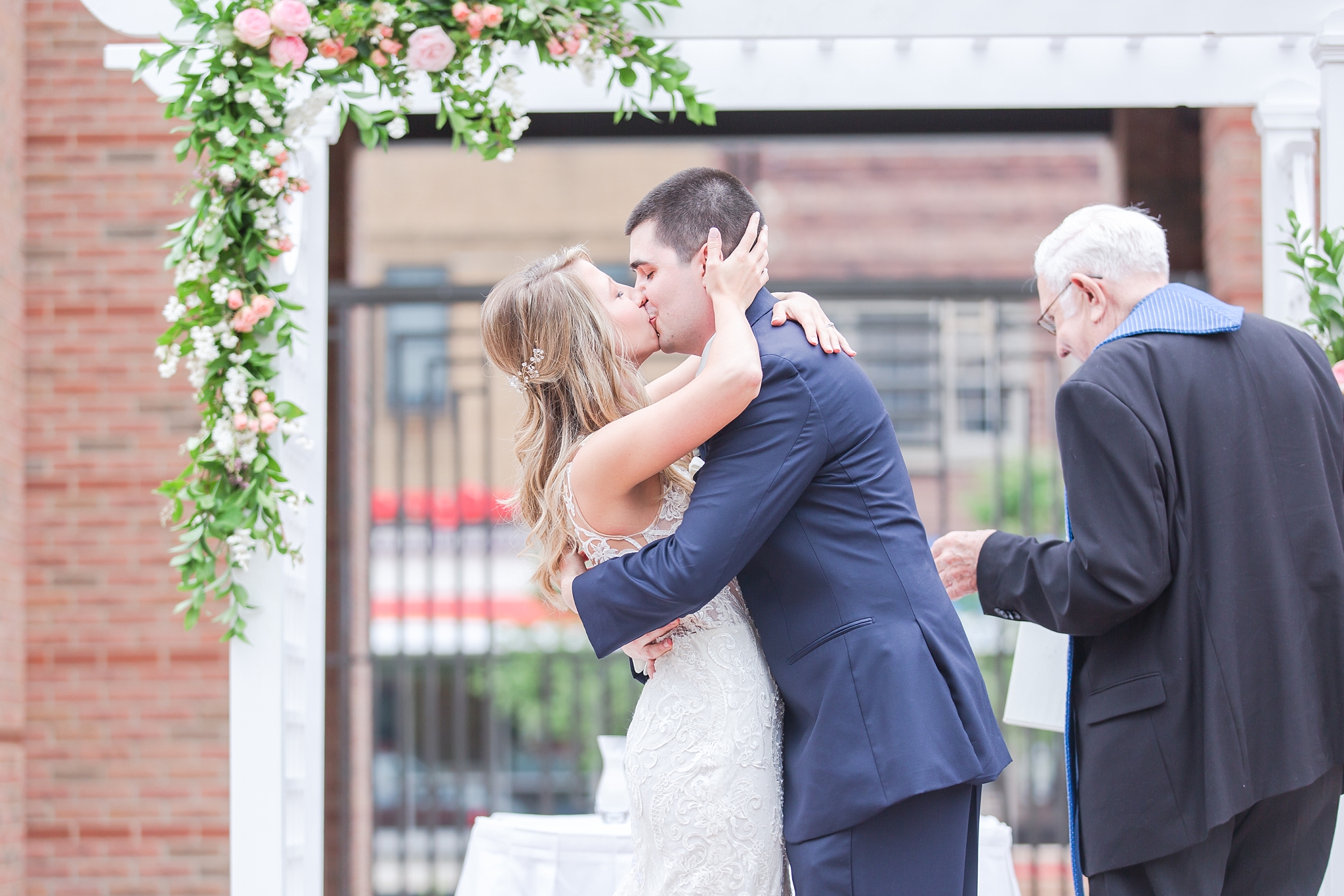 candid-romantic-wedding-photos-at-the-h-hotel-in-midland-michigan-by-courtney-carolyn-photography_0075.jpg